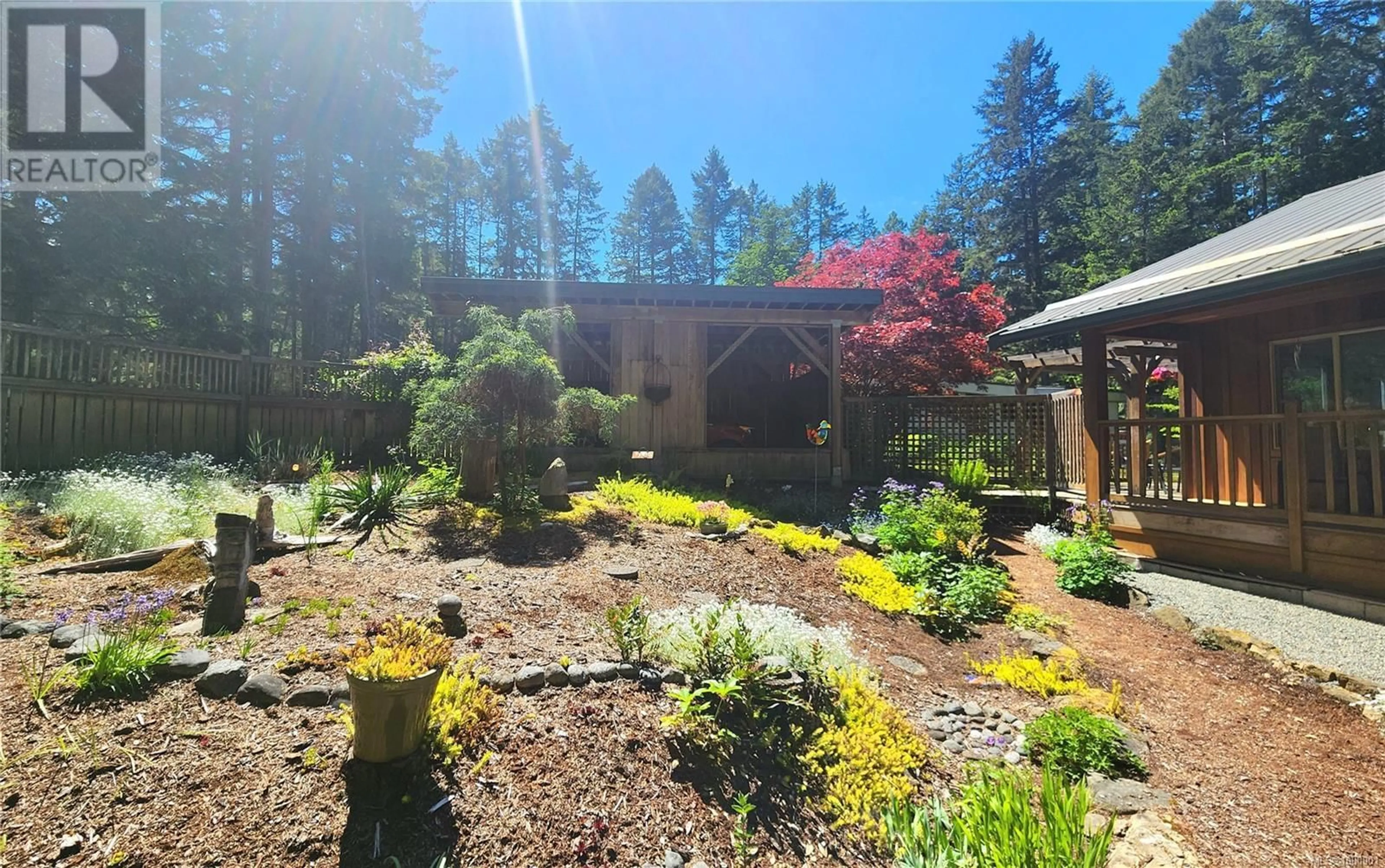 A pic from outside/outdoor area/front of a property/back of a property/a pic from drone, unknown for 741 LOCKINVAR LANE, Gabriola Island British Columbia V0R1X3