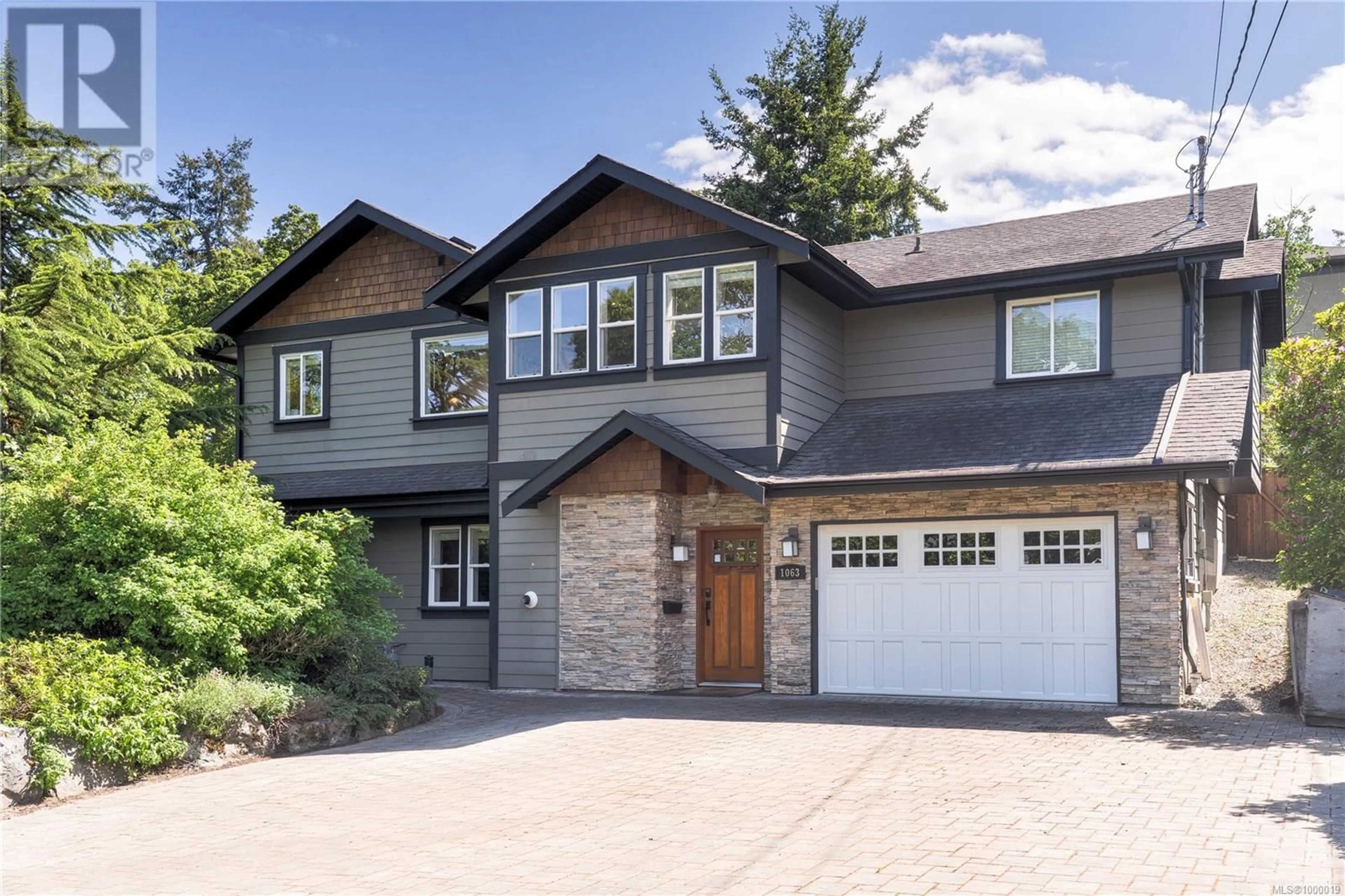 Home with brick exterior material, street for 1063 CHESTERFIELD ROAD, Saanich British Columbia V8Z2T9