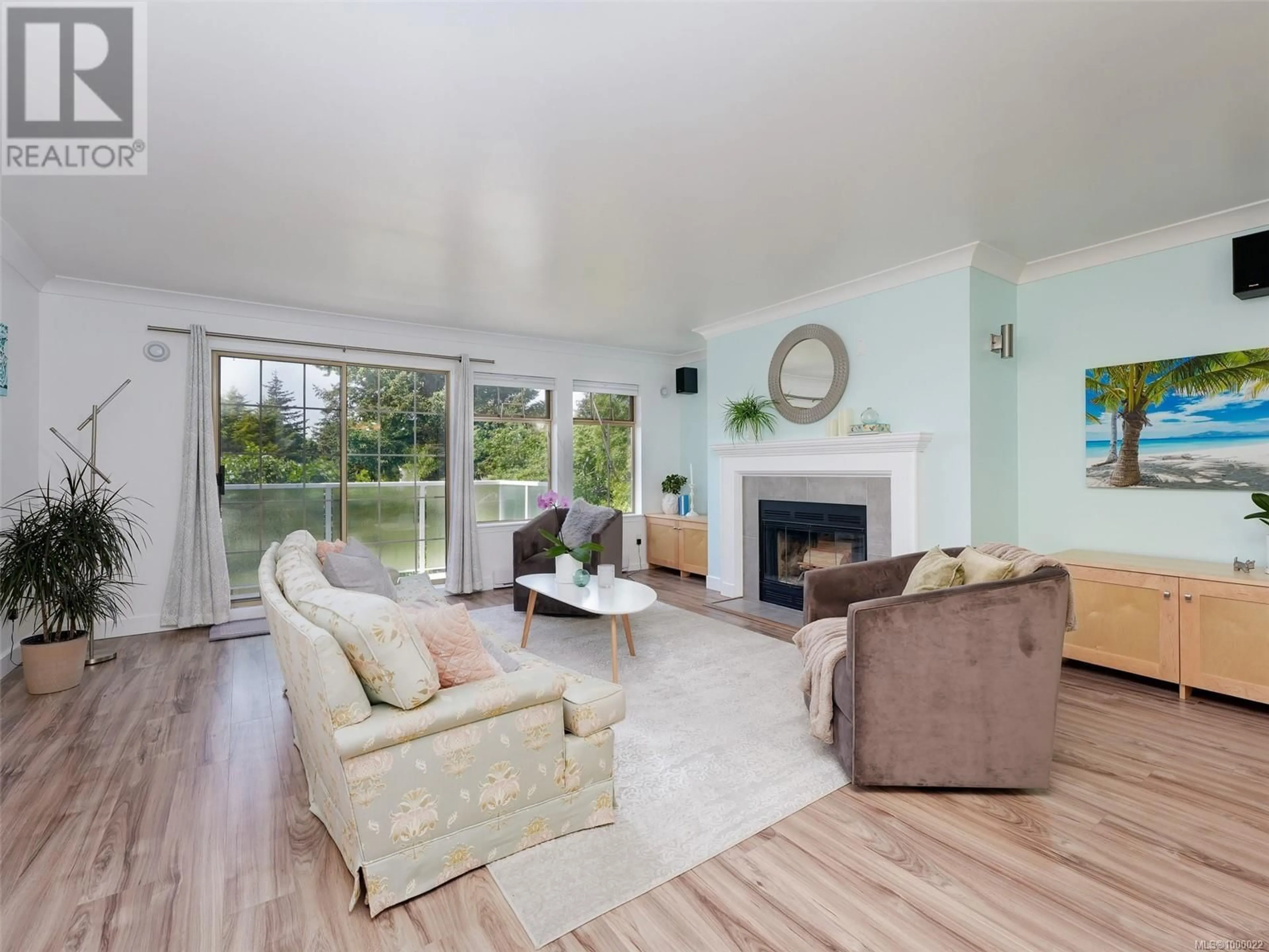 Living room with furniture, wood/laminate floor for 23 - 850 PARKLANDS DRIVE, Esquimalt British Columbia V9A7L9