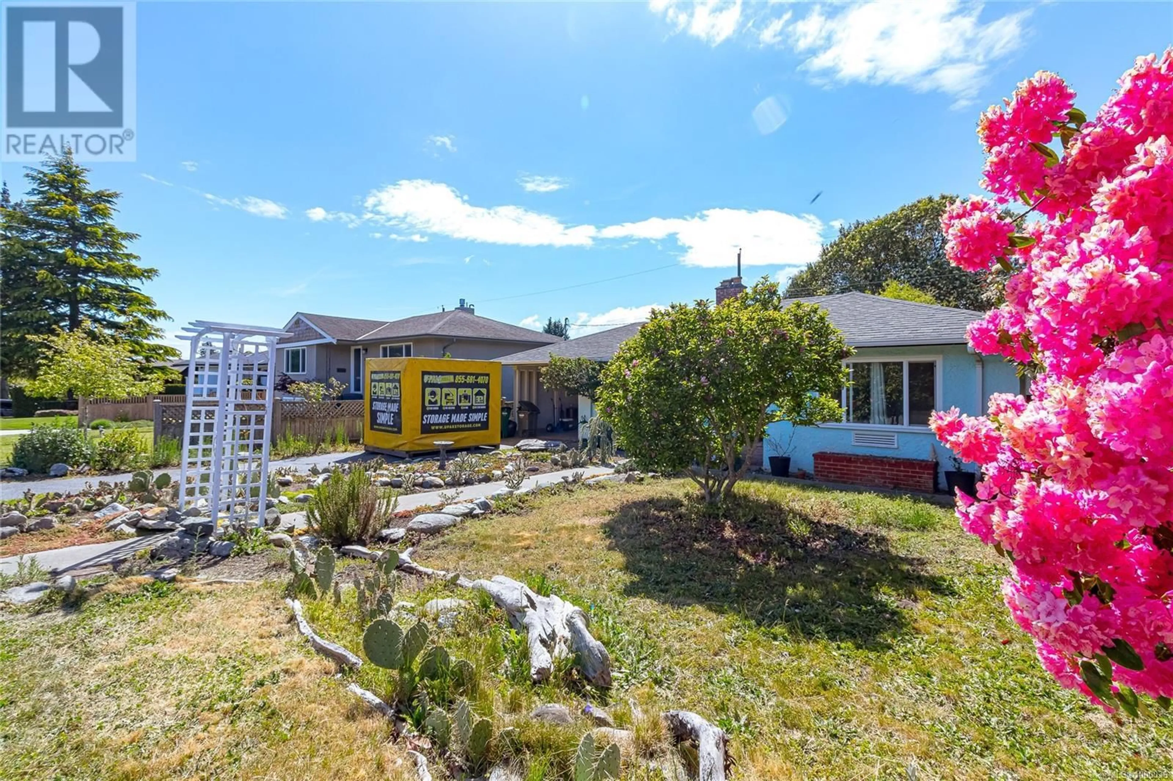 A pic from outside/outdoor area/front of a property/back of a property/a pic from drone, mountain view for 3228 SERVICE STREET, Saanich British Columbia V8P4M7