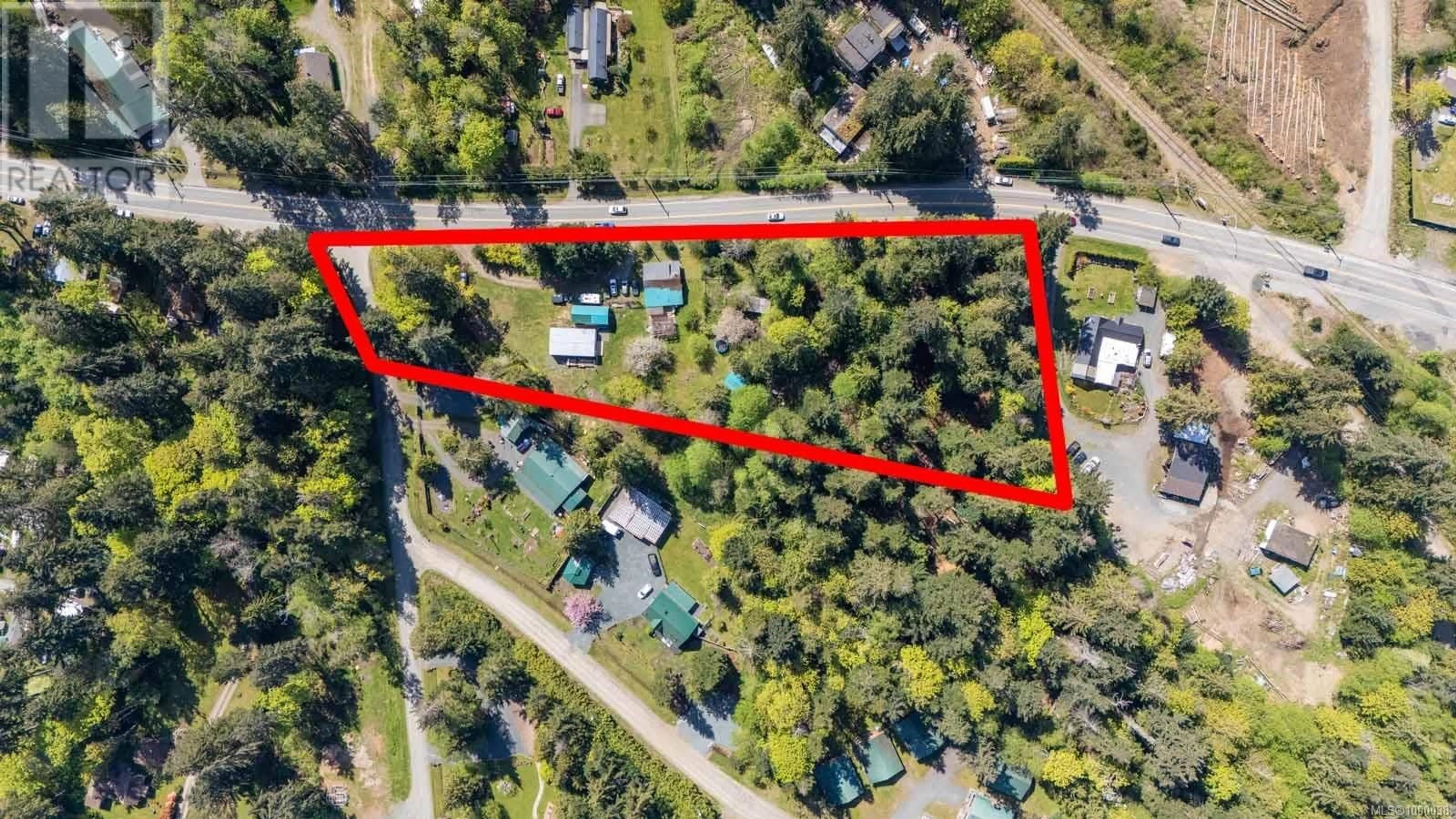 A pic from outside/outdoor area/front of a property/back of a property/a pic from drone, street for 6931 ISLAND HIGHWAY WEST, Bowser British Columbia V0R1G0