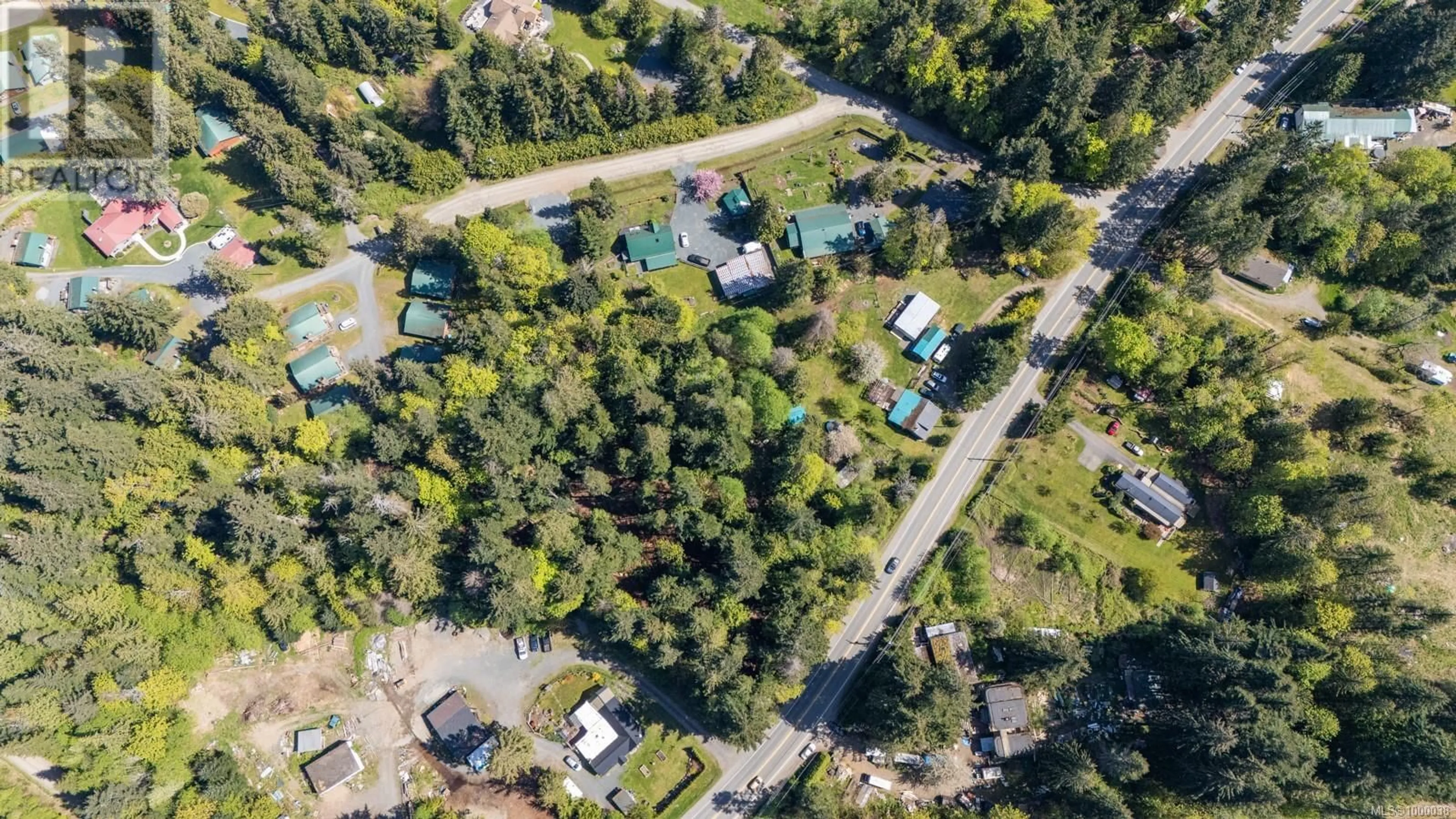 A pic from outside/outdoor area/front of a property/back of a property/a pic from drone, street for 6931 ISLAND HIGHWAY WEST, Bowser British Columbia V0R1G0