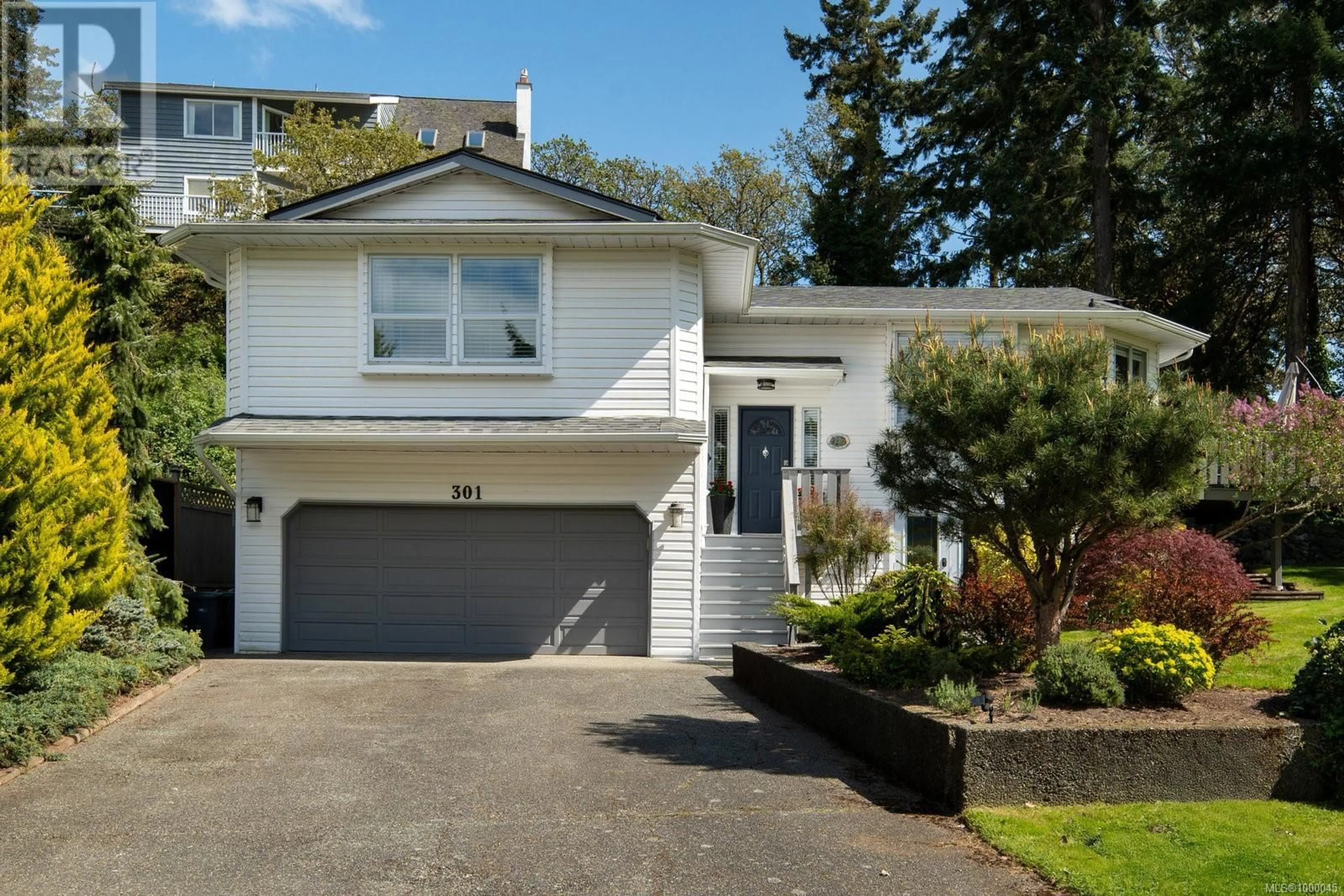 Home with vinyl exterior material, street for 301 GULL ROAD, View Royal British Columbia V9B1L3