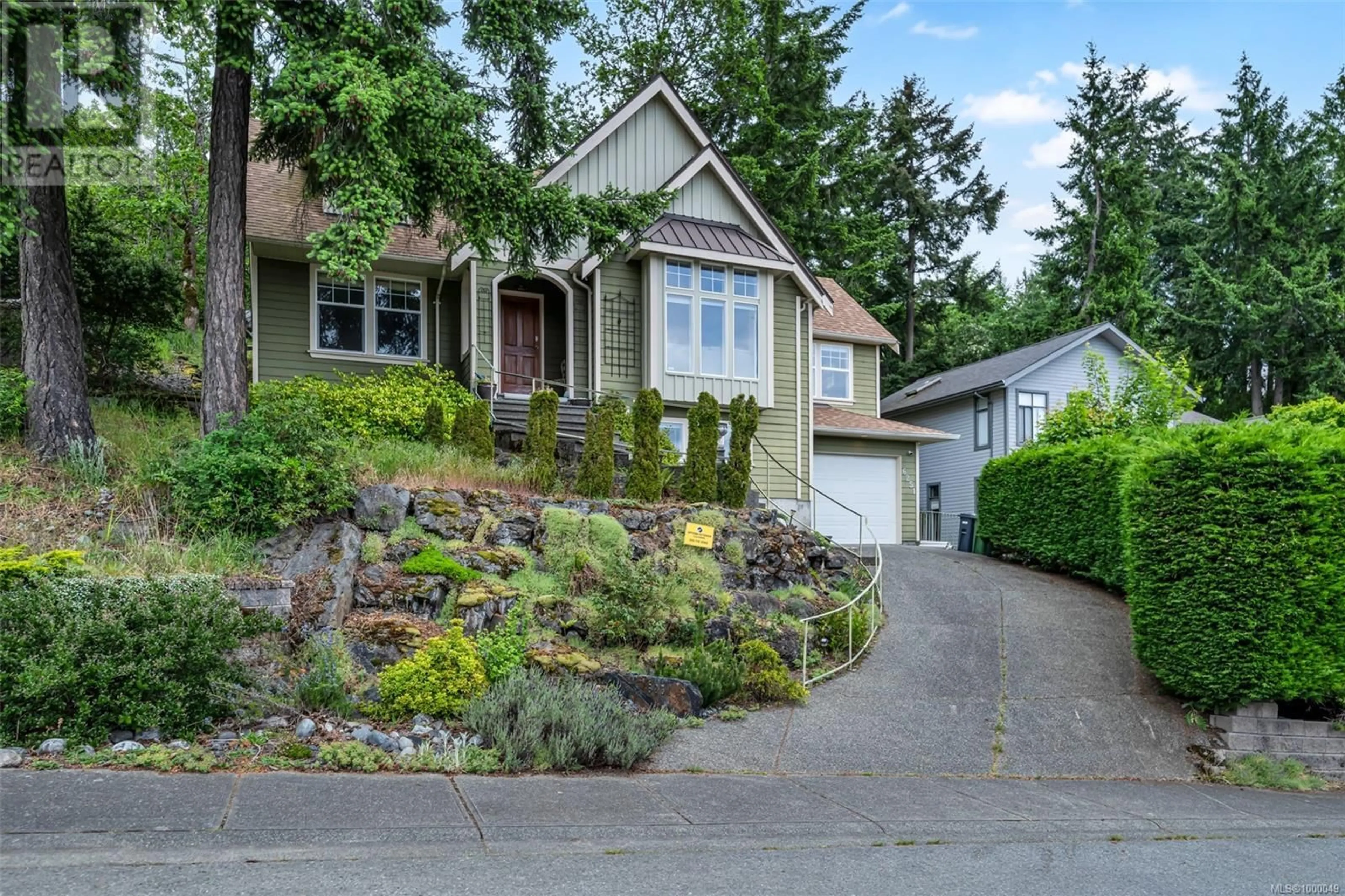 Home with vinyl exterior material, street for 6251 THOMSON TERRACE, Duncan British Columbia V9L5R1