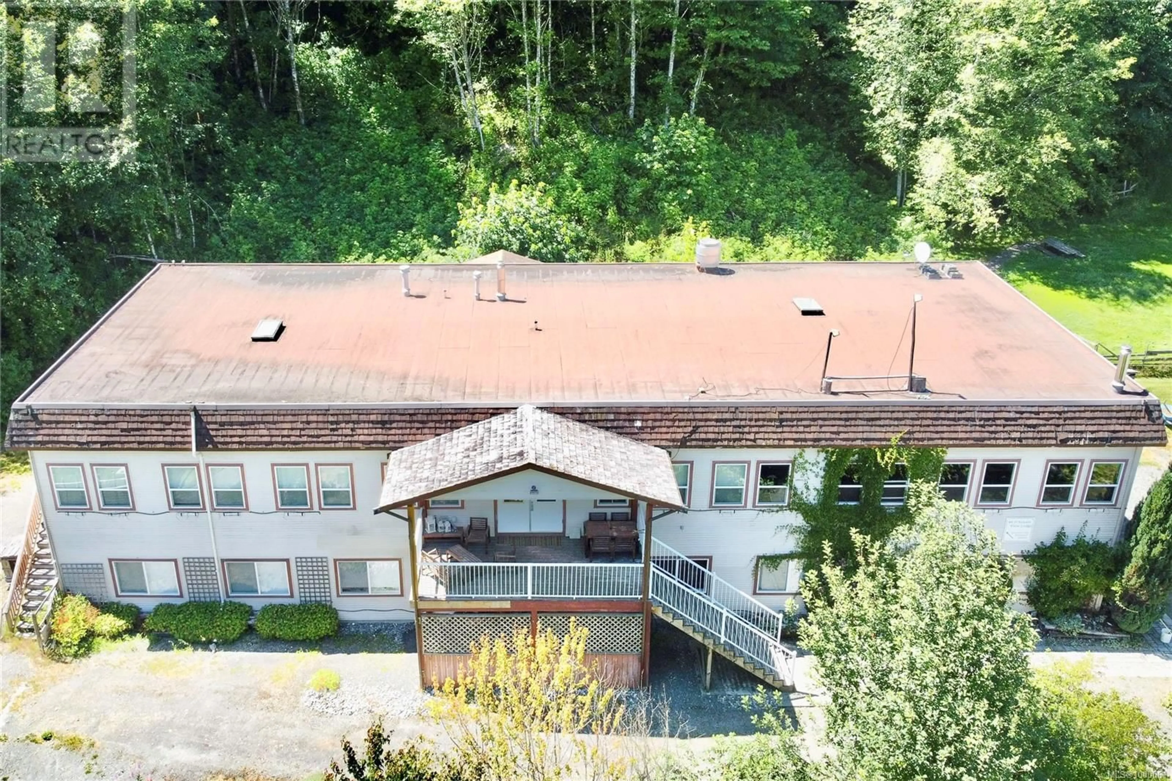 A pic from outside/outdoor area/front of a property/back of a property/a pic from drone, building for 1165 SALMON RIVER MAIN LINE, Sayward British Columbia V0P1R0