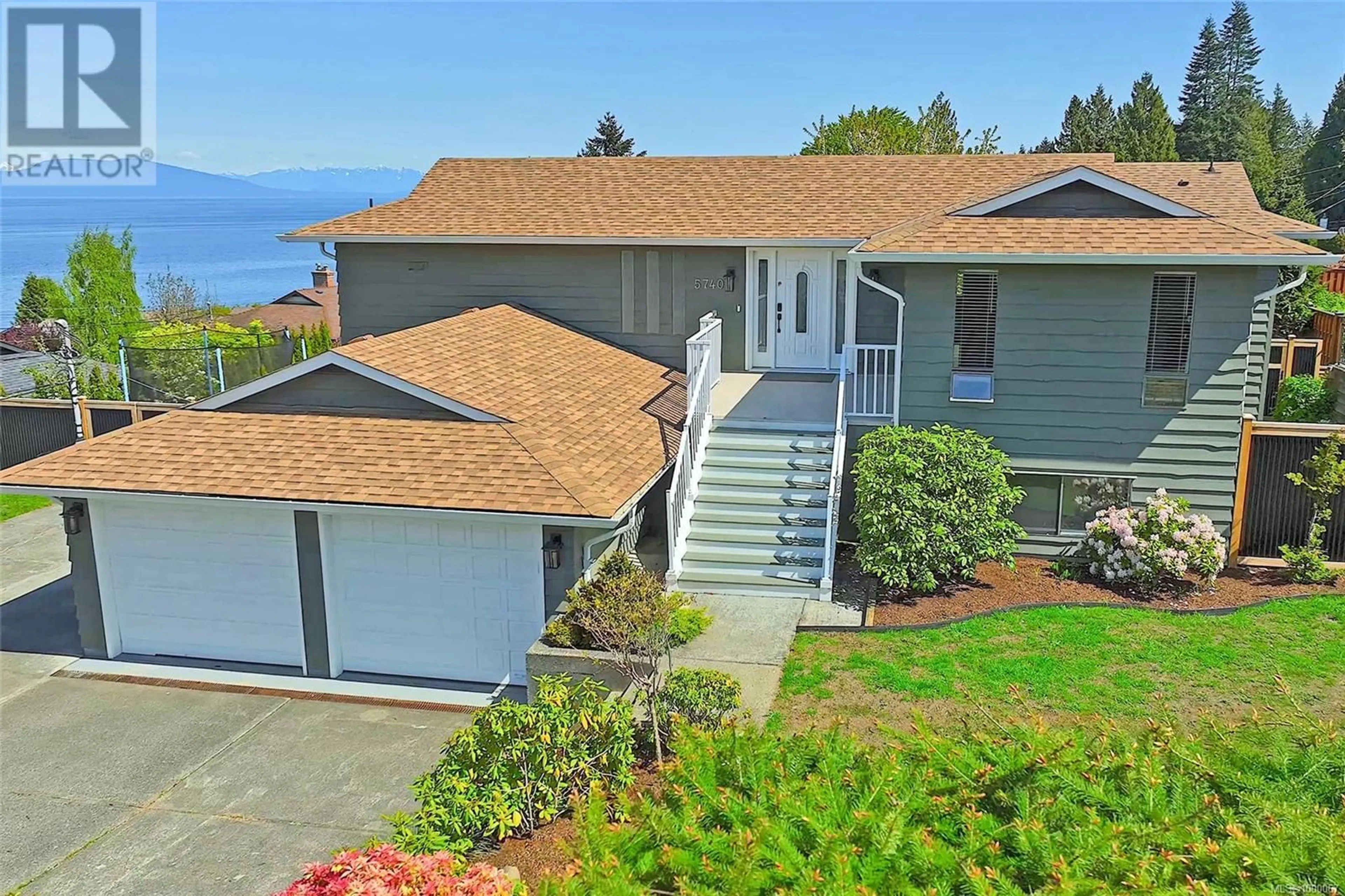 A pic from outside/outdoor area/front of a property/back of a property/a pic from drone, water/lake/river/ocean view for 5740 NORASEA ROAD, Nanaimo British Columbia V9V1G6
