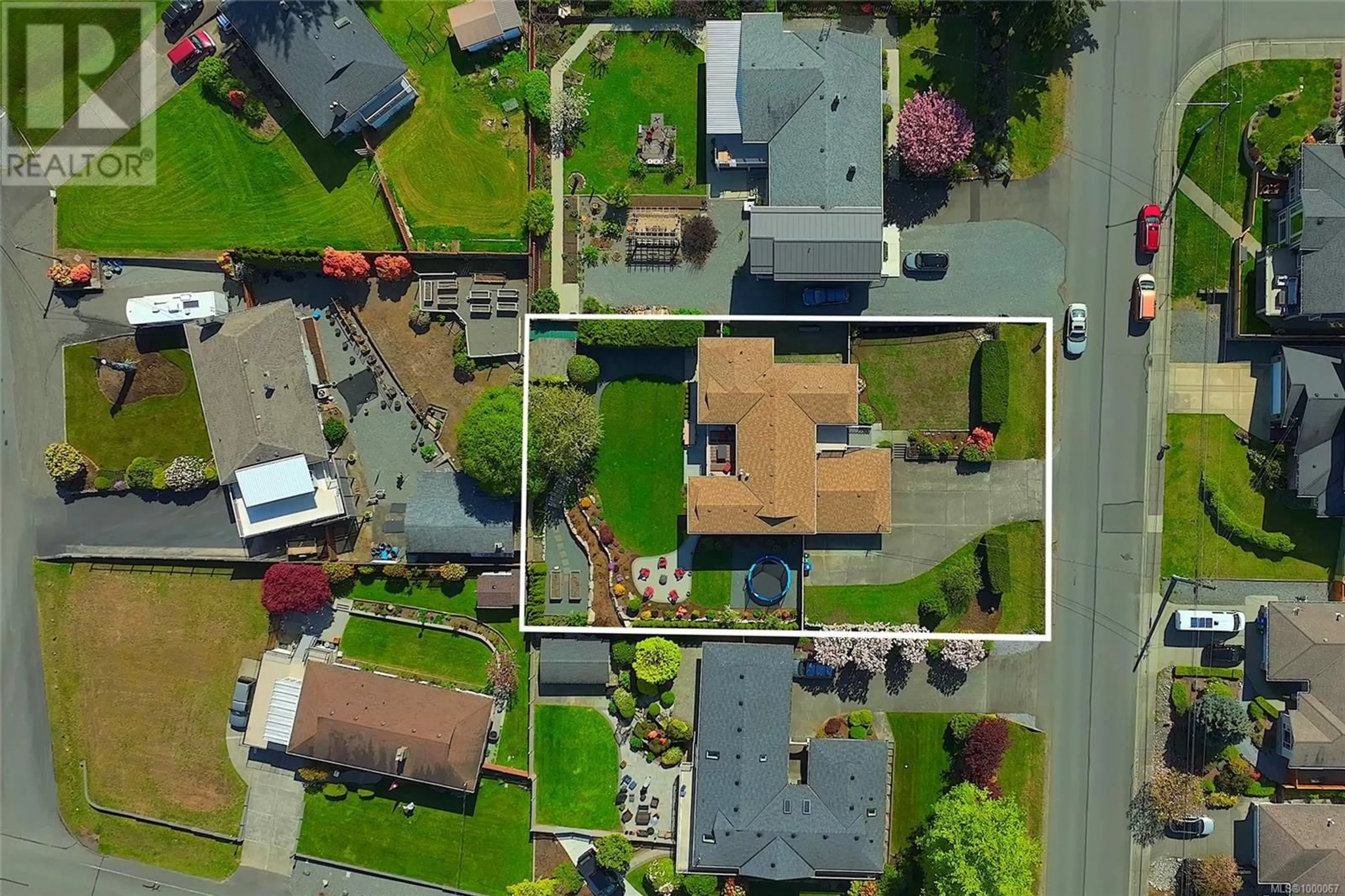 A pic from outside/outdoor area/front of a property/back of a property/a pic from drone, street for 5740 NORASEA ROAD, Nanaimo British Columbia V9V1G6