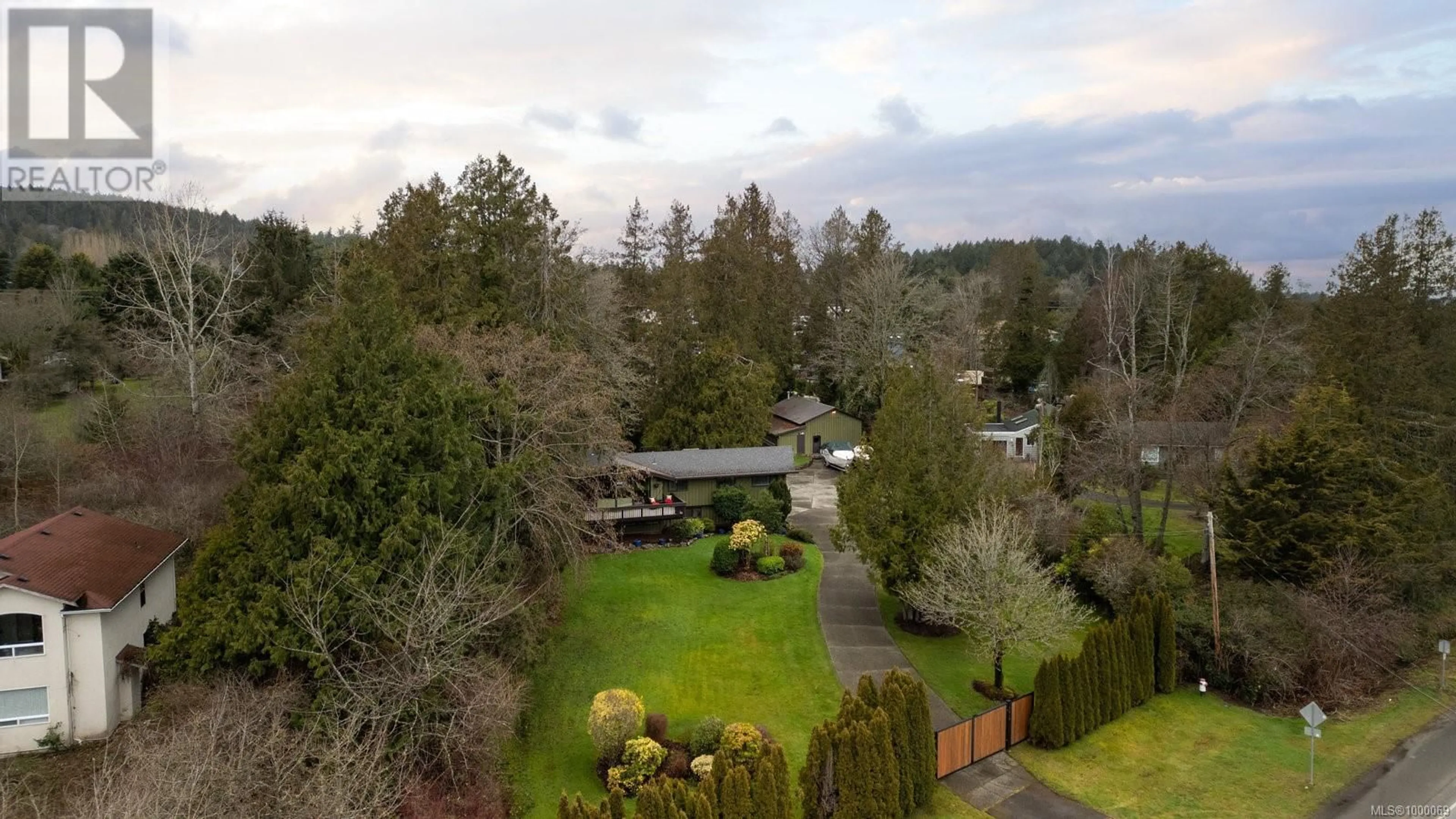 A pic from outside/outdoor area/front of a property/back of a property/a pic from drone, forest/trees view for 9218 CANORA ROAD, North Saanich British Columbia V8L1N9