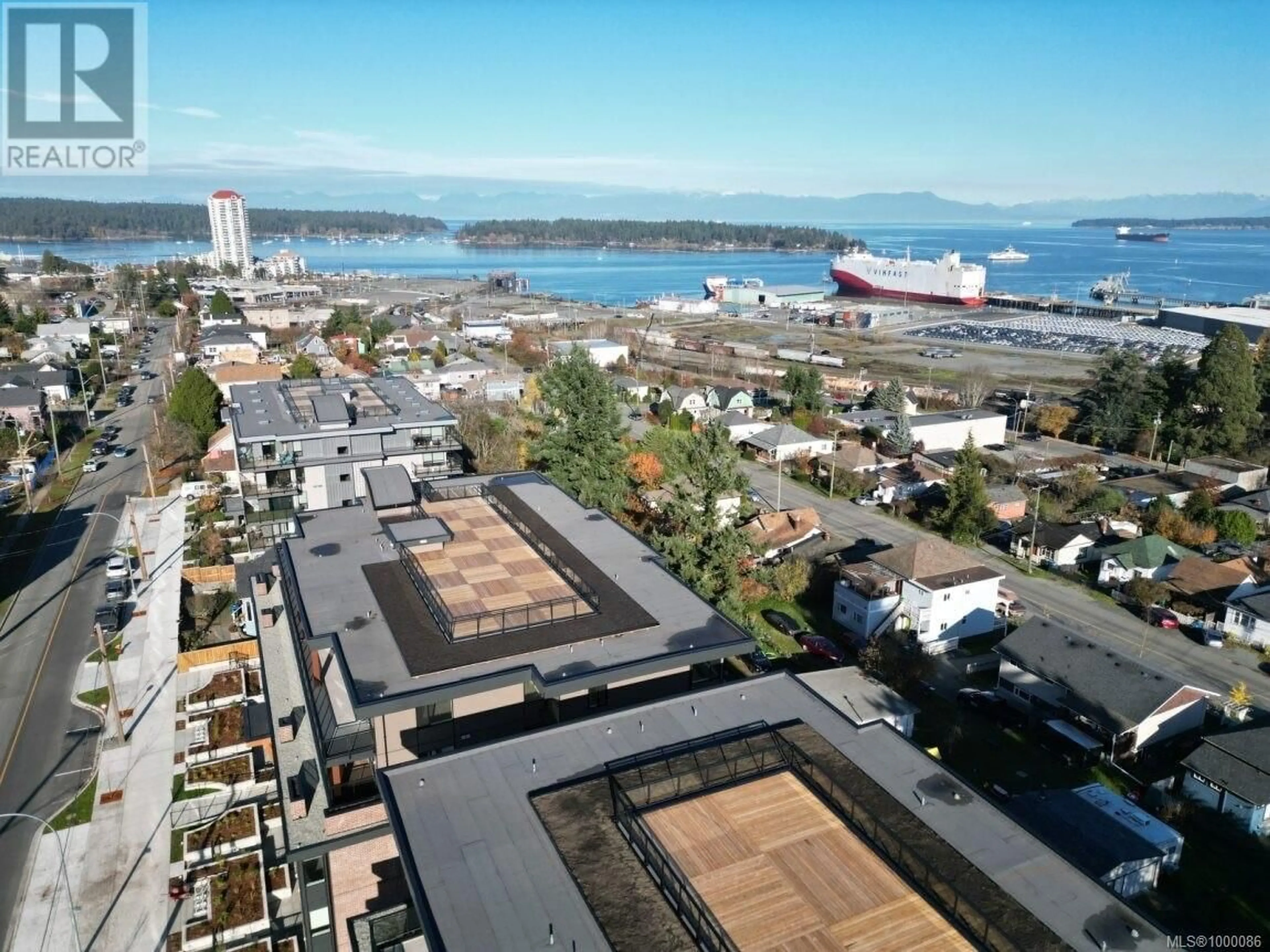 A pic from outside/outdoor area/front of a property/back of a property/a pic from drone, city buildings view from balcony for 207 - 135 HALIBURTON STREET, Nanaimo British Columbia V9R4V9