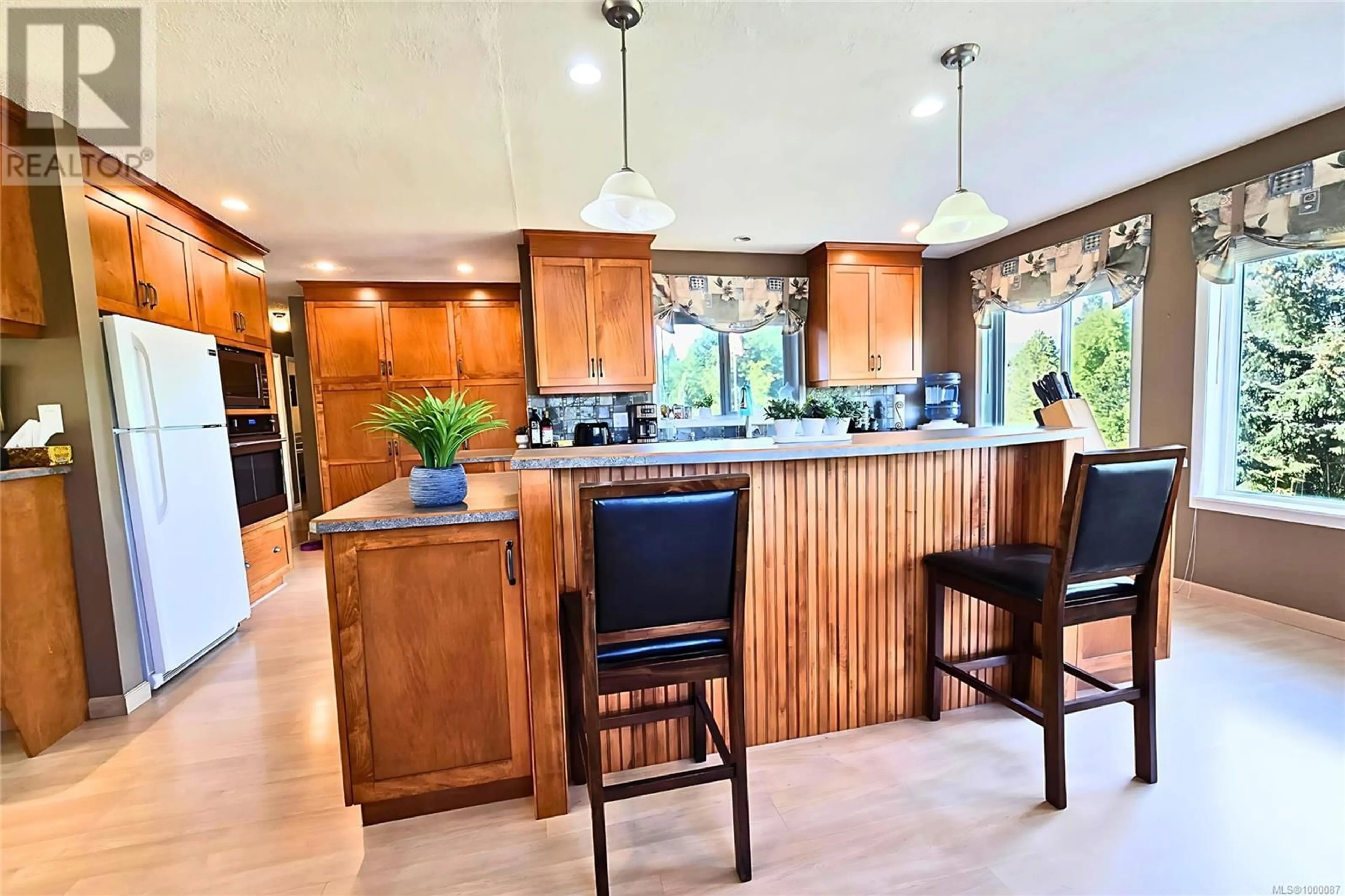 Open concept kitchen, ceramic/tile floor for 1689 BAY STREET, Ucluelet British Columbia V0R3A0
