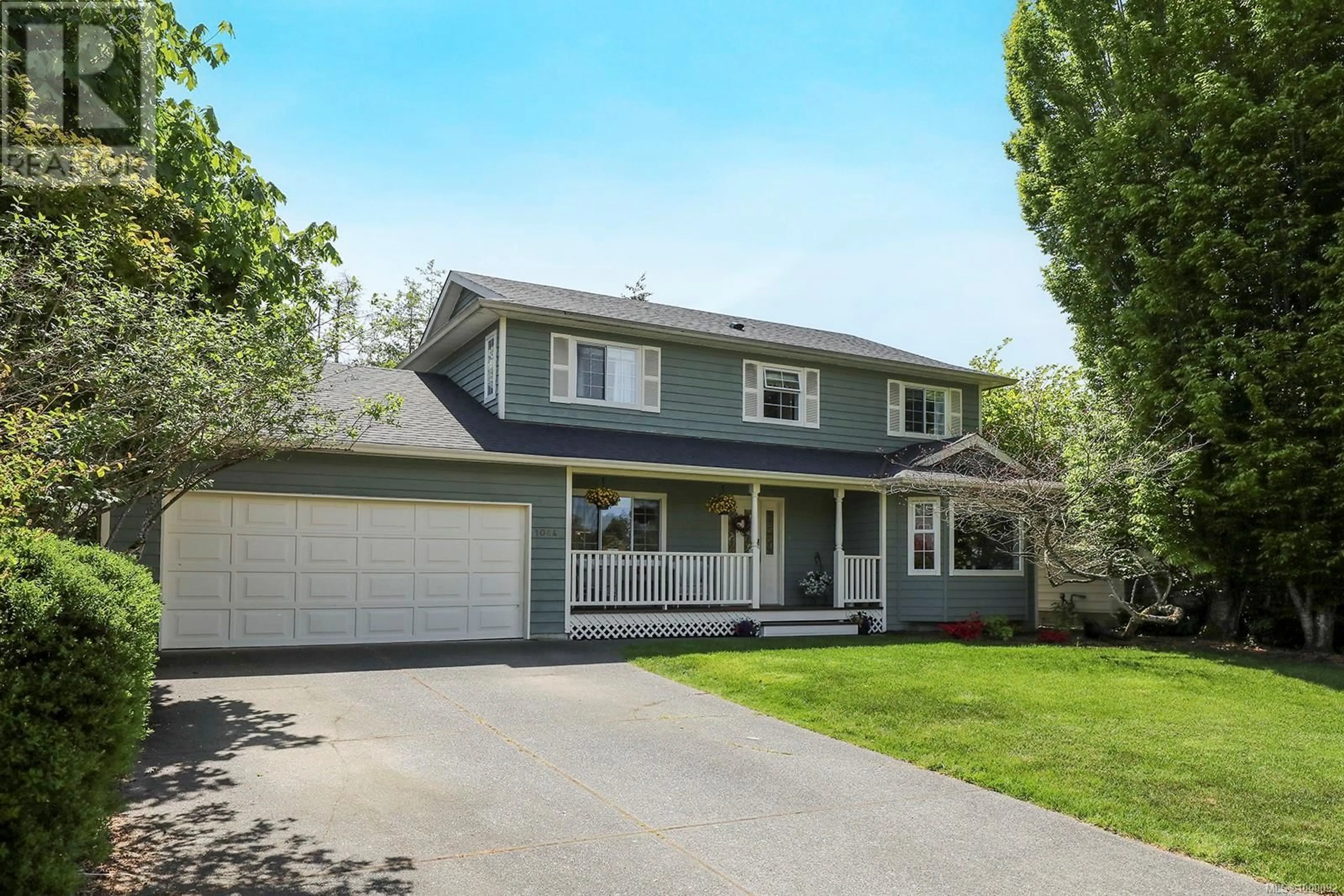 Home with vinyl exterior material, street for 1044 MALAHAT DRIVE, Courtenay British Columbia V9N8W4