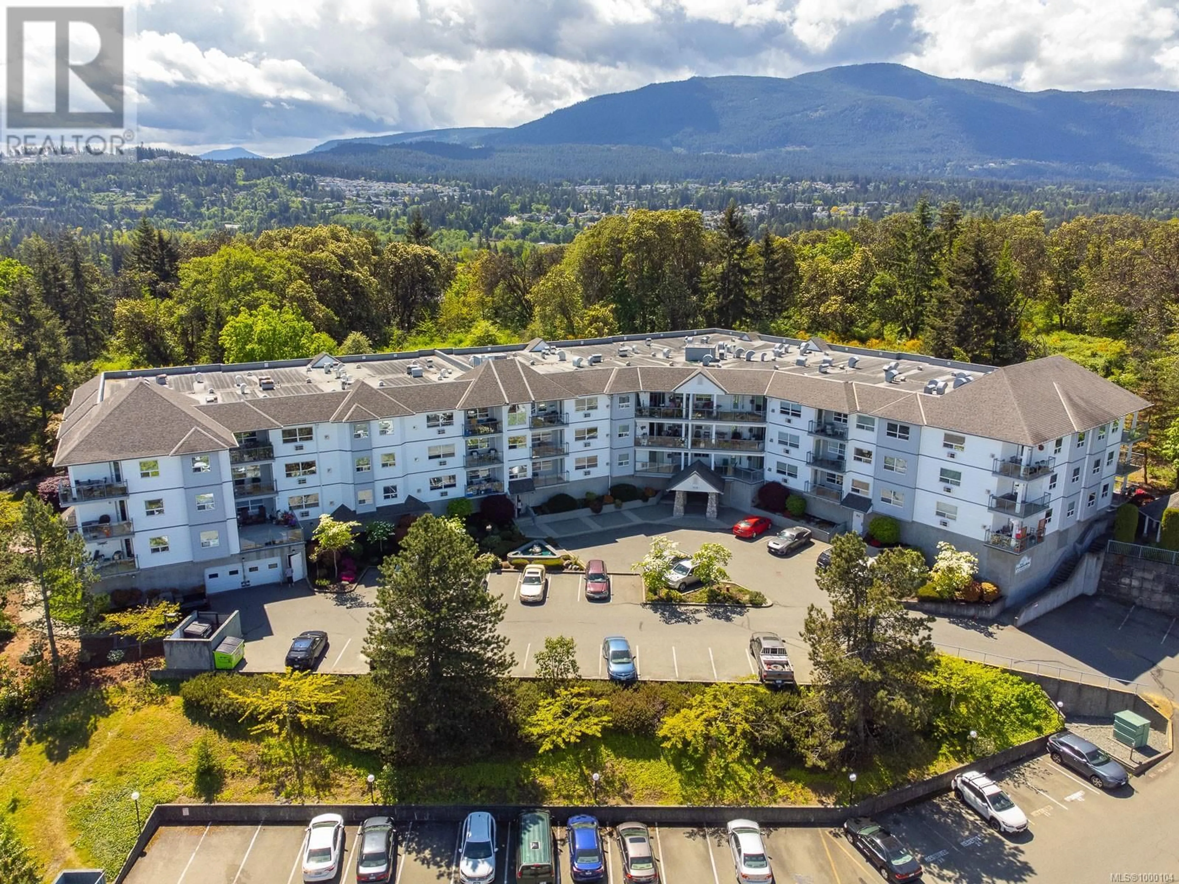 A pic from outside/outdoor area/front of a property/back of a property/a pic from drone, mountain view for 201 - 1633 DUFFERIN CRESCENT, Nanaimo British Columbia V9S5T4