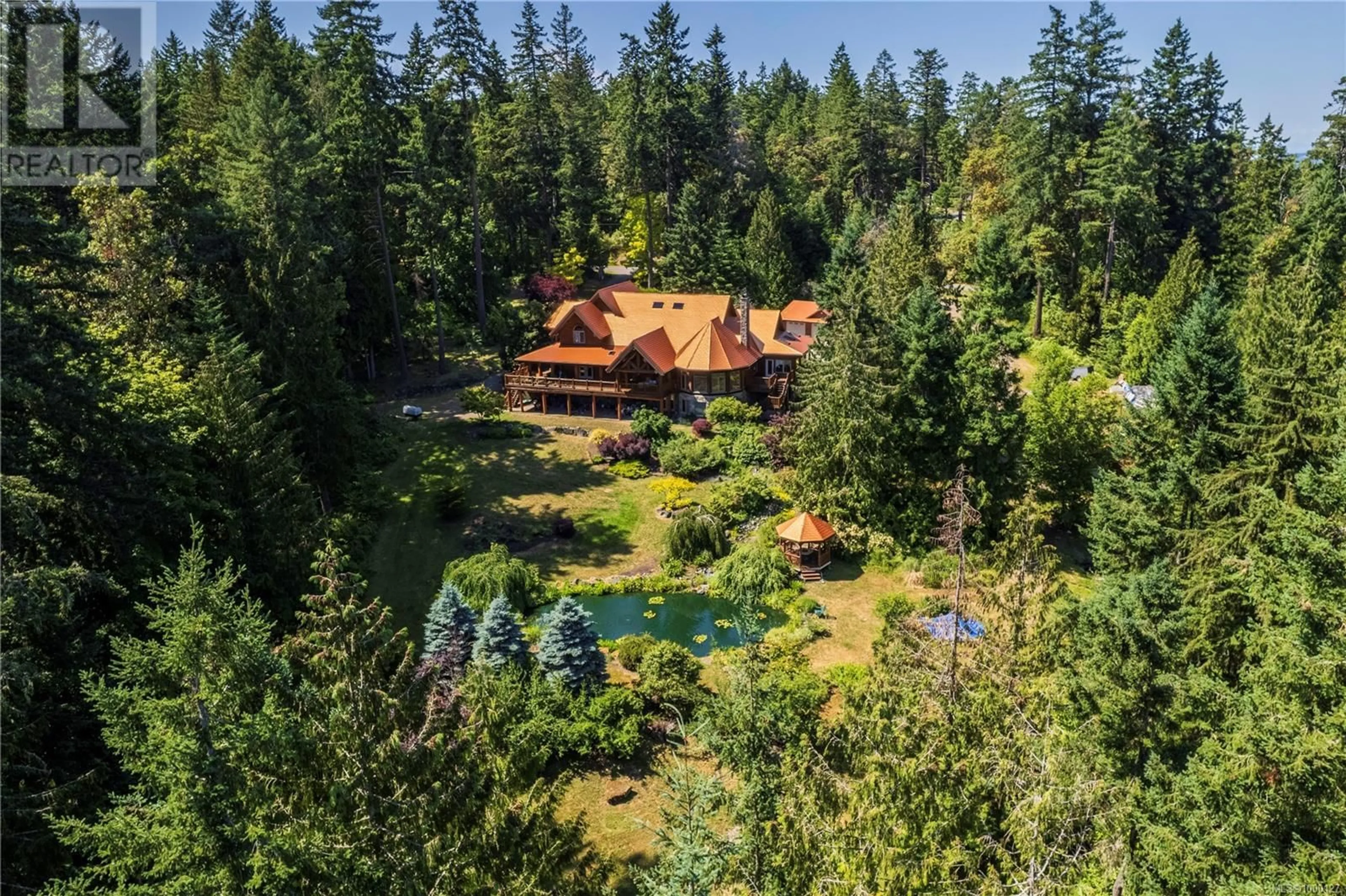 A pic from outside/outdoor area/front of a property/back of a property/a pic from drone, forest/trees view for 4828 JUDITHS RUN, Ladysmith British Columbia V9G1G9