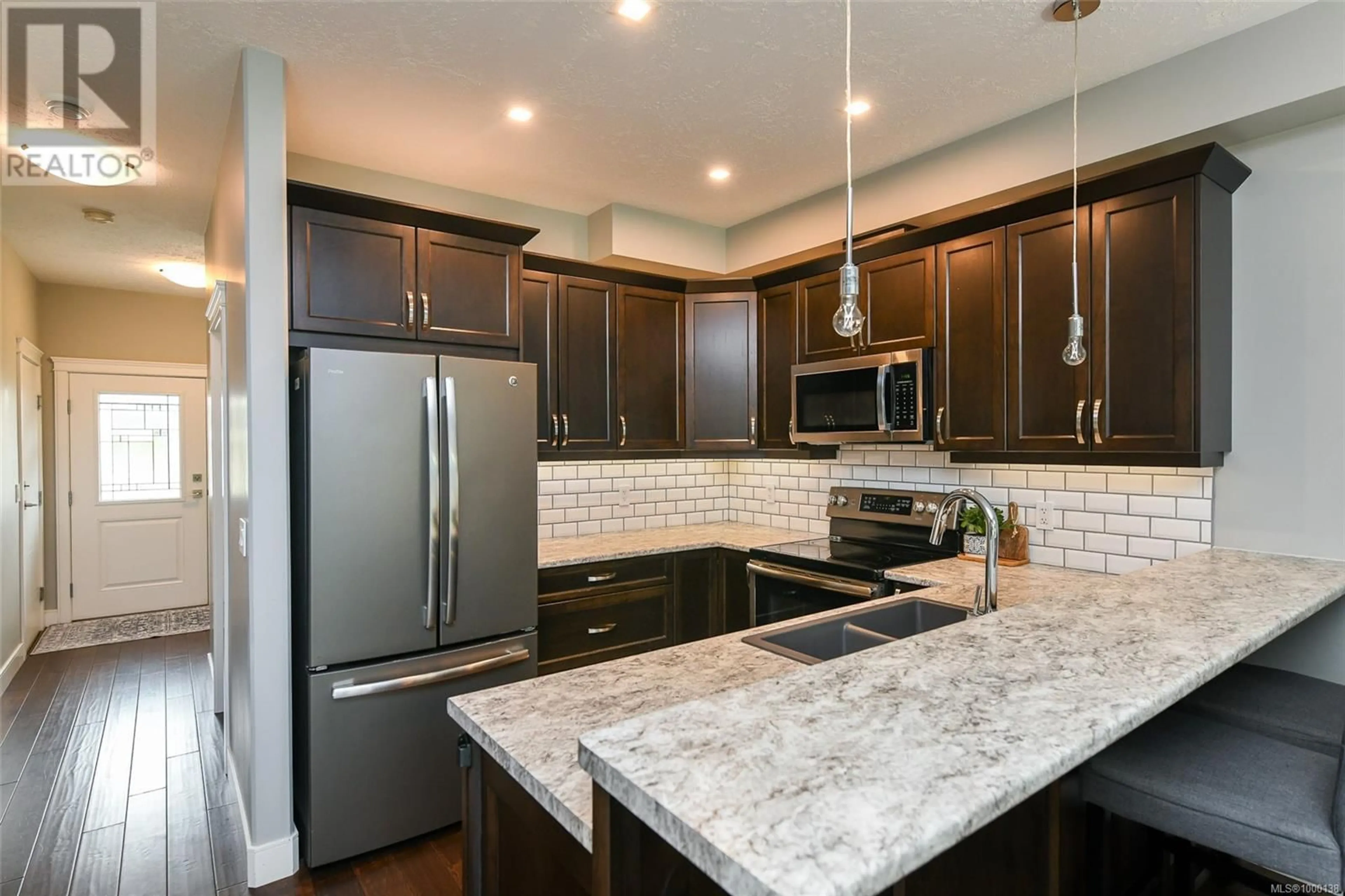 Open concept kitchen, ceramic/tile floor for 108 - 2077 20TH STREET, Courtenay British Columbia V9N0G2