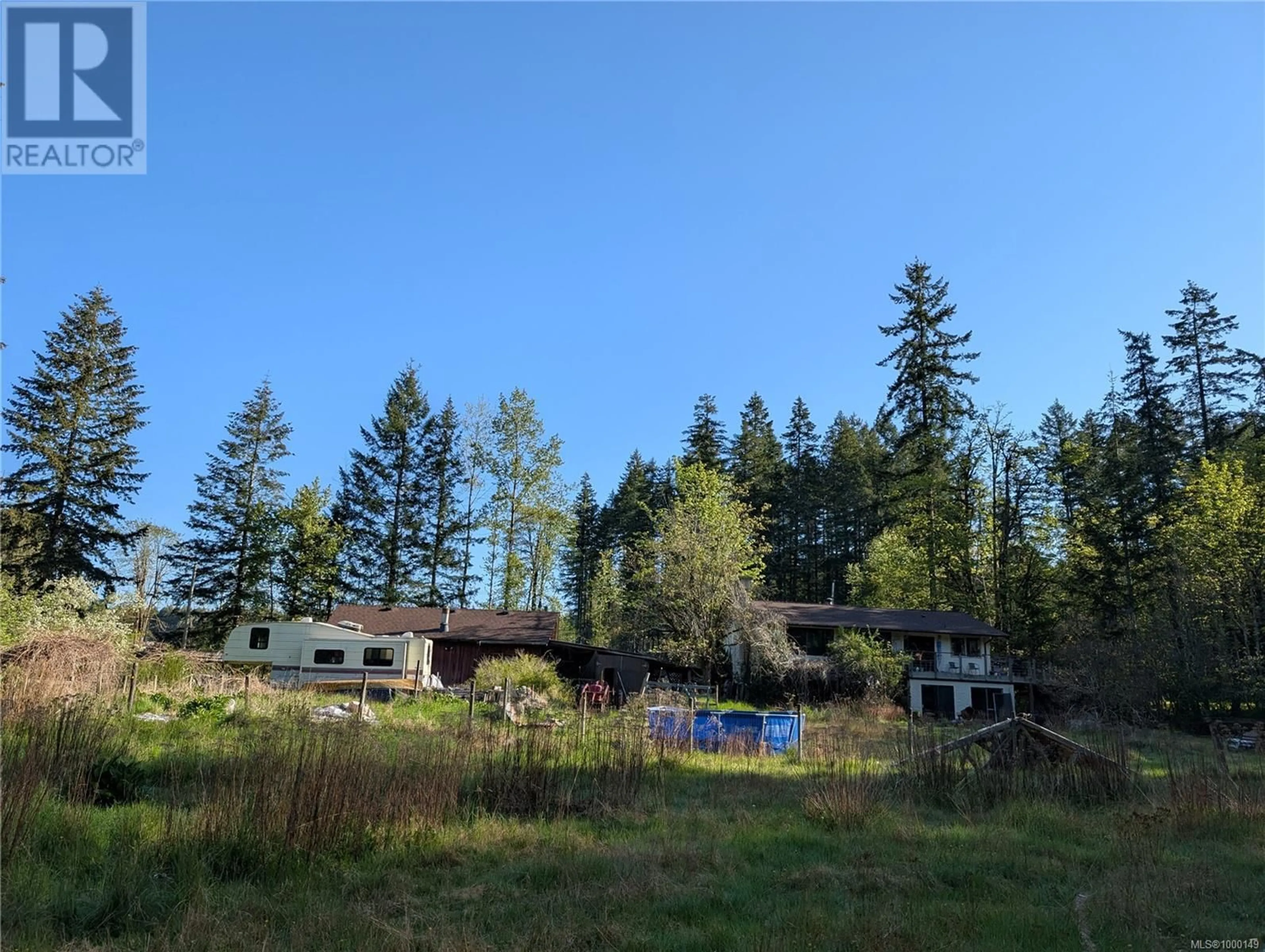 A pic from outside/outdoor area/front of a property/back of a property/a pic from drone, forest/trees view for 3923 PIERCY ROAD, Courtenay British Columbia V9J1R7