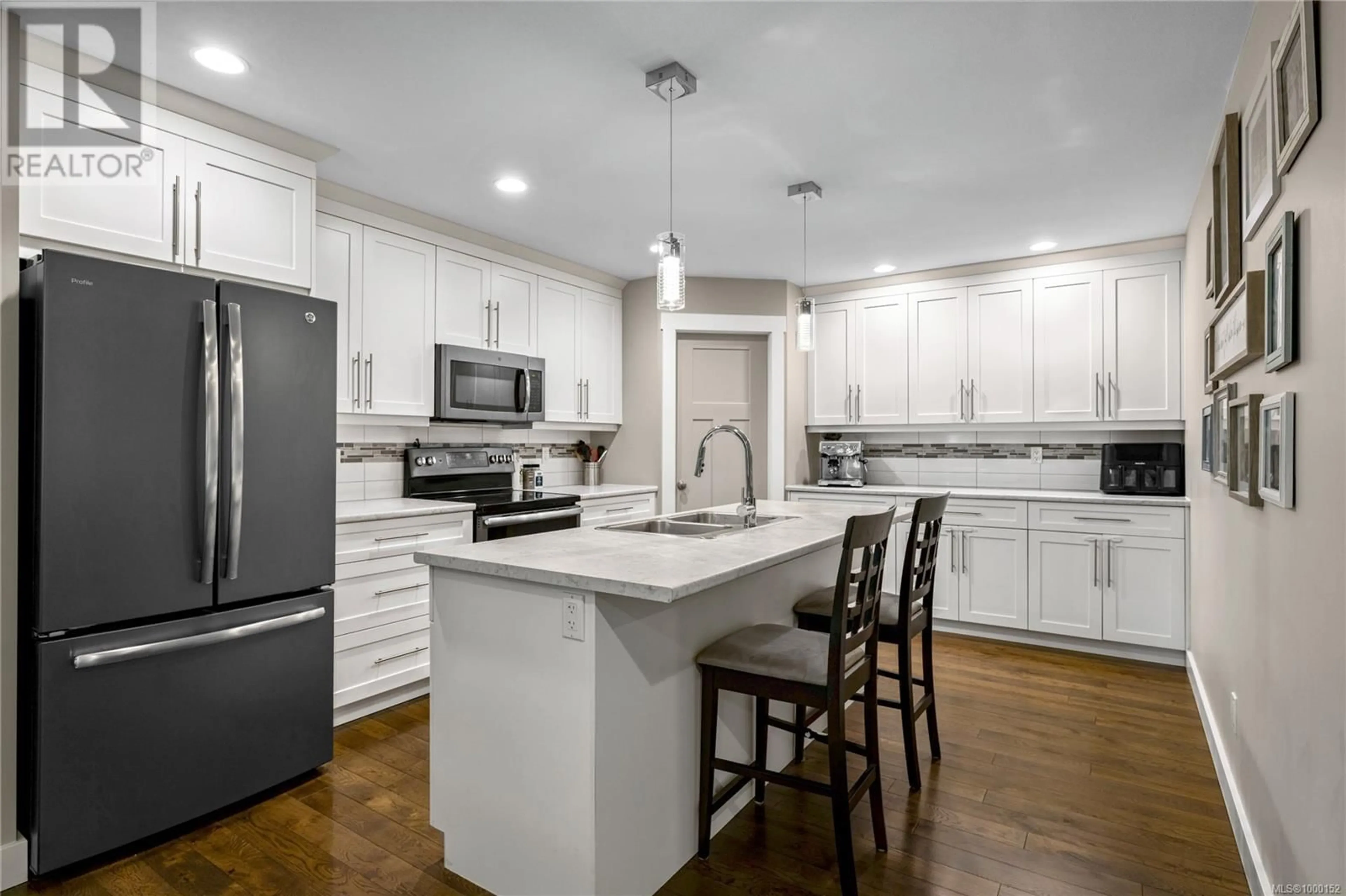 Open concept kitchen, ceramic/tile floor for 2378 EXTENSION ROAD, Nanaimo British Columbia V9X0A9