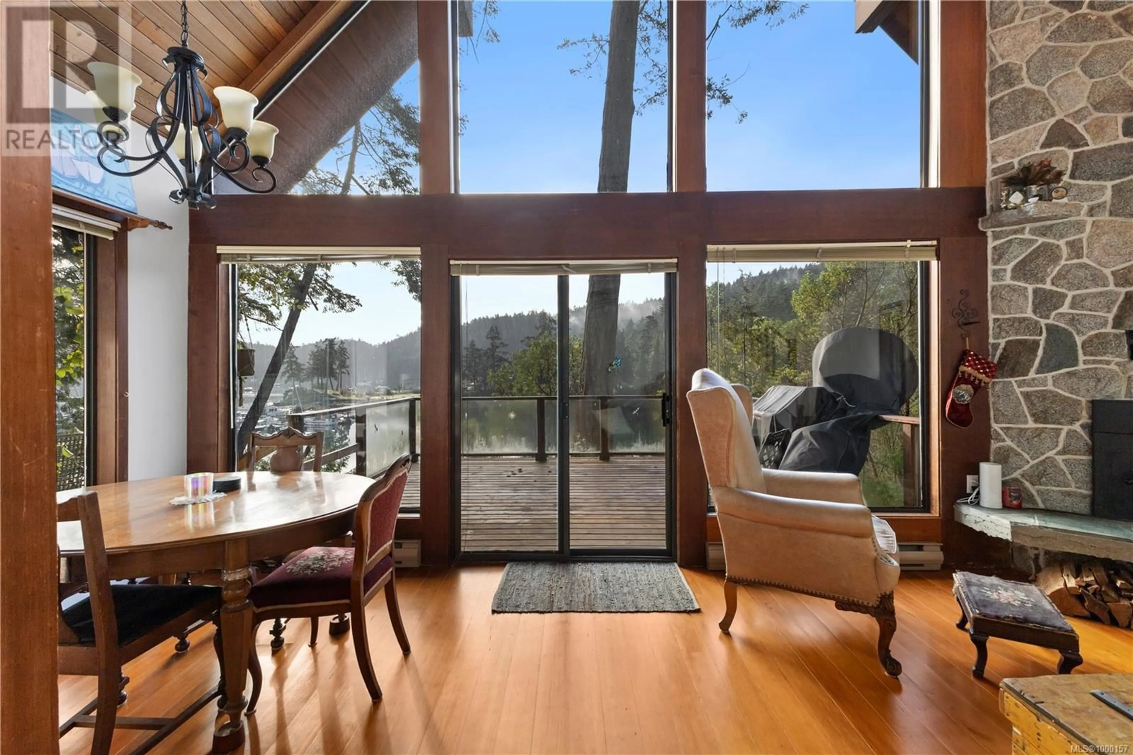 Dining room, wood/laminate floor for 4602 PECOS ROAD, Pender Island British Columbia V0N2M1