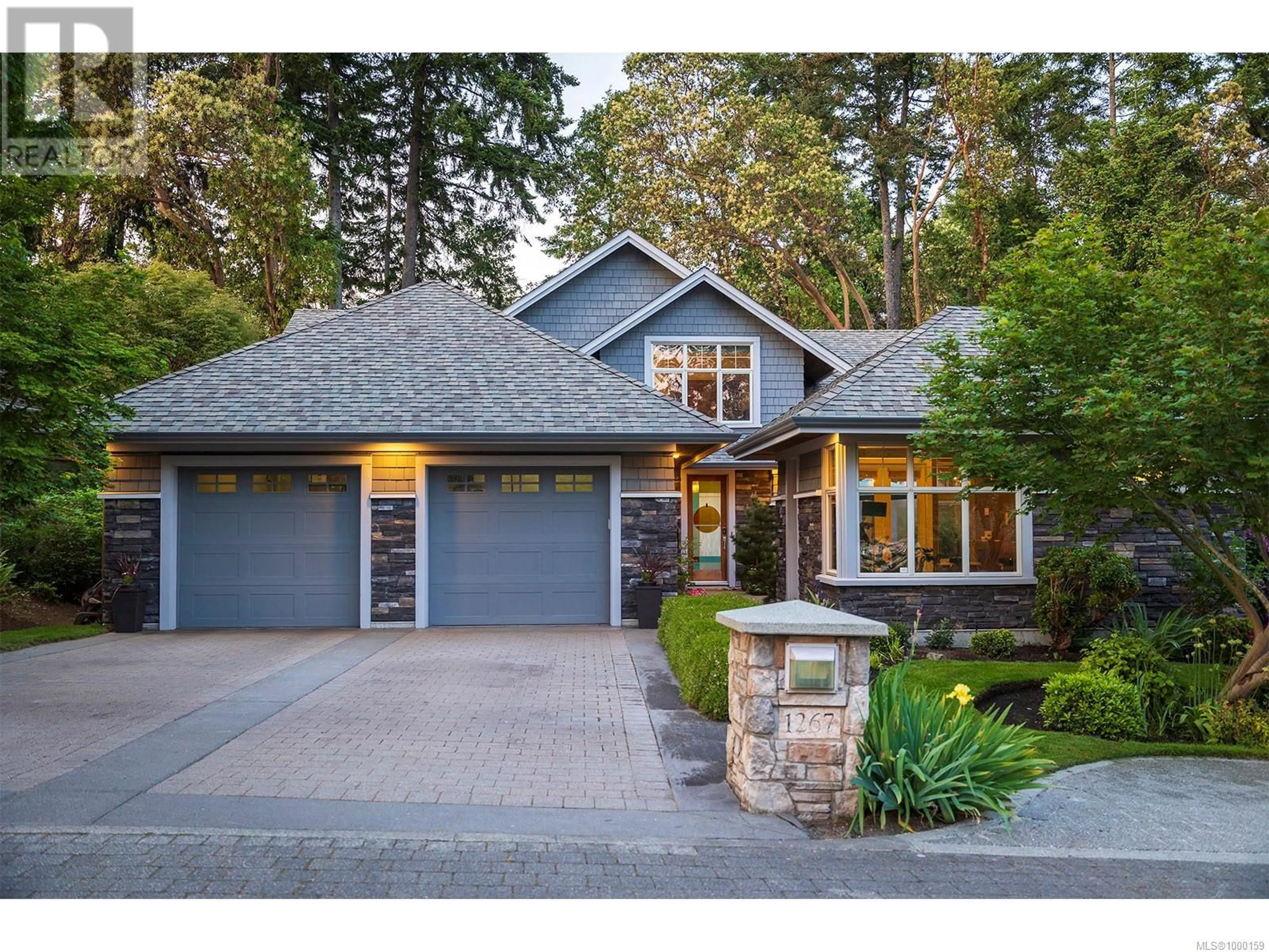Home with brick exterior material, street for 1267 OCEANWOOD LANE, Saanich British Columbia V8X0A4