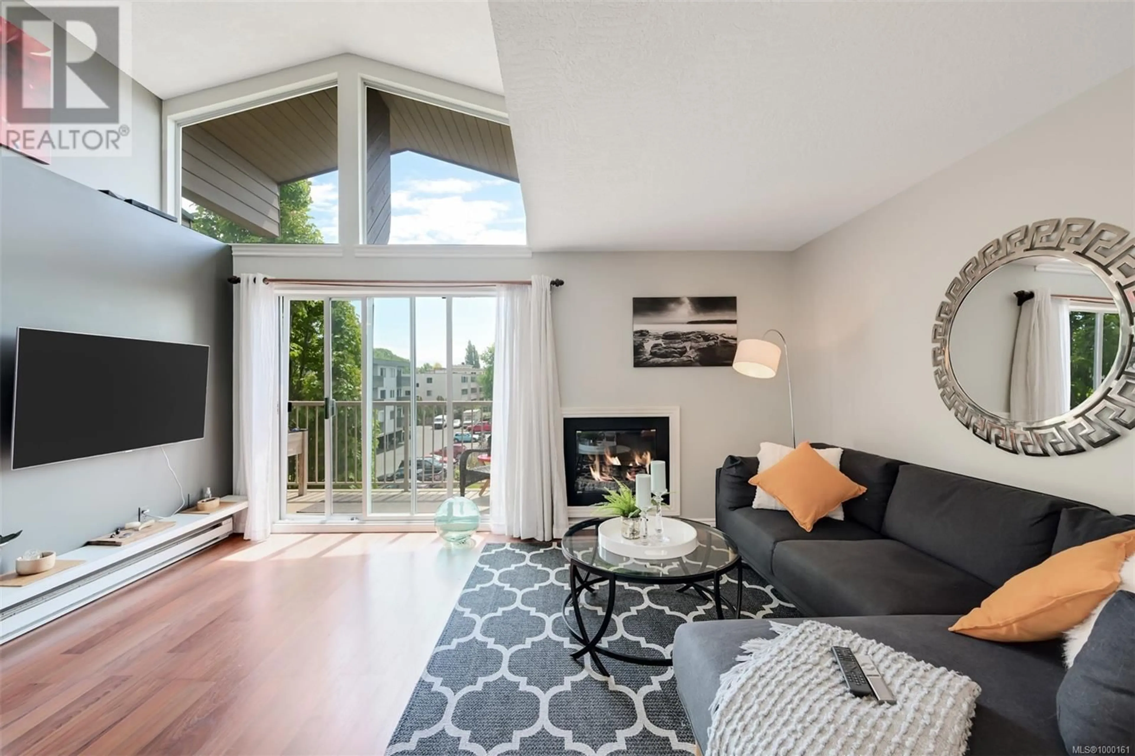 Living room with furniture, unknown for 406 - 1055 HILLSIDE AVENUE, Victoria British Columbia V8T2A4