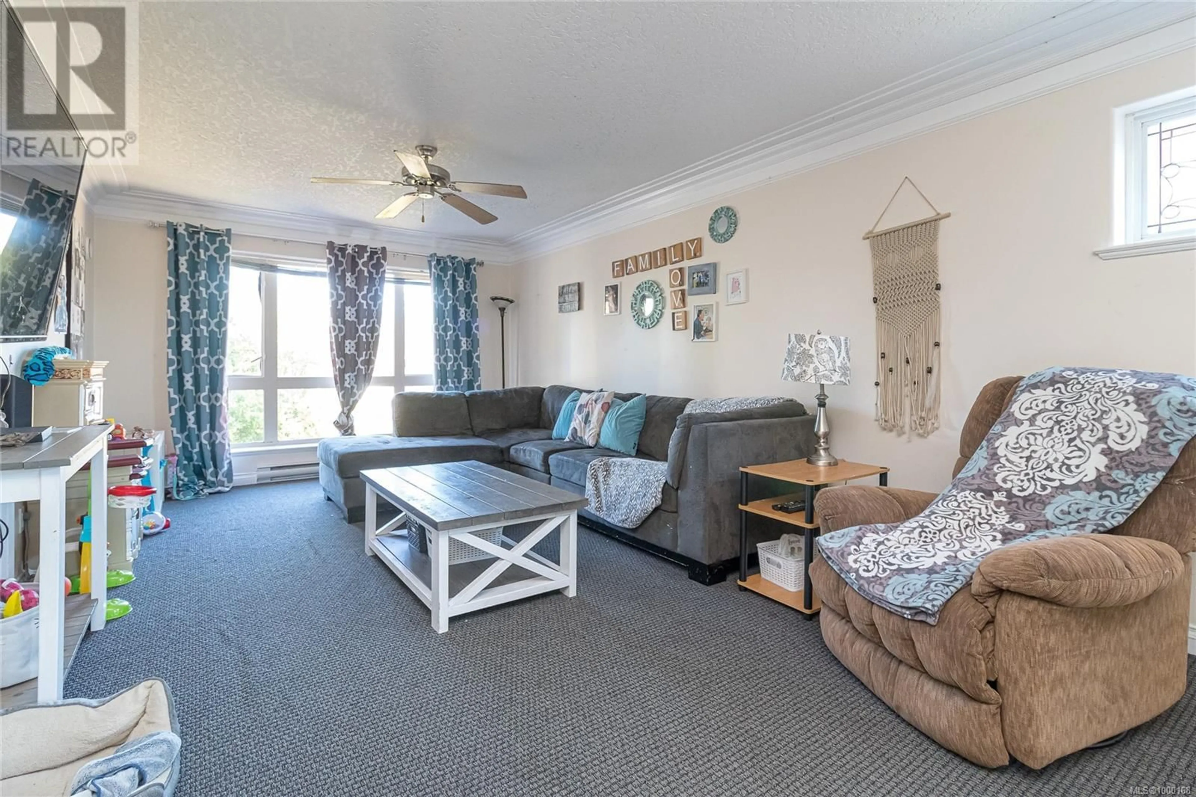 Living room with furniture, unknown for 100 BURNETT ROAD, View Royal British Columbia V9B2X8