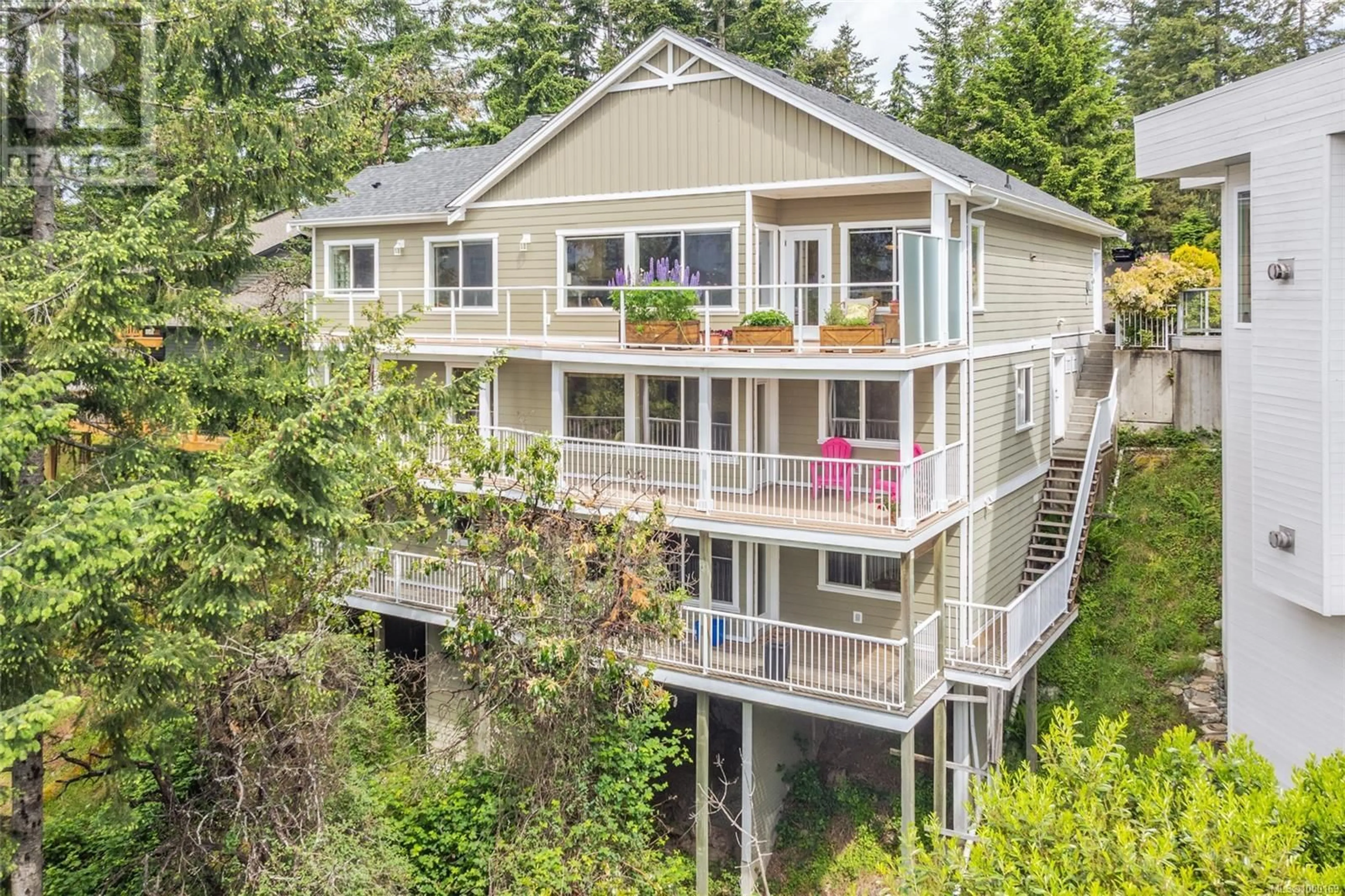A pic from outside/outdoor area/front of a property/back of a property/a pic from drone, water/lake/river/ocean view for 721 QUAIL PLACE, Nanaimo British Columbia V9T5R2