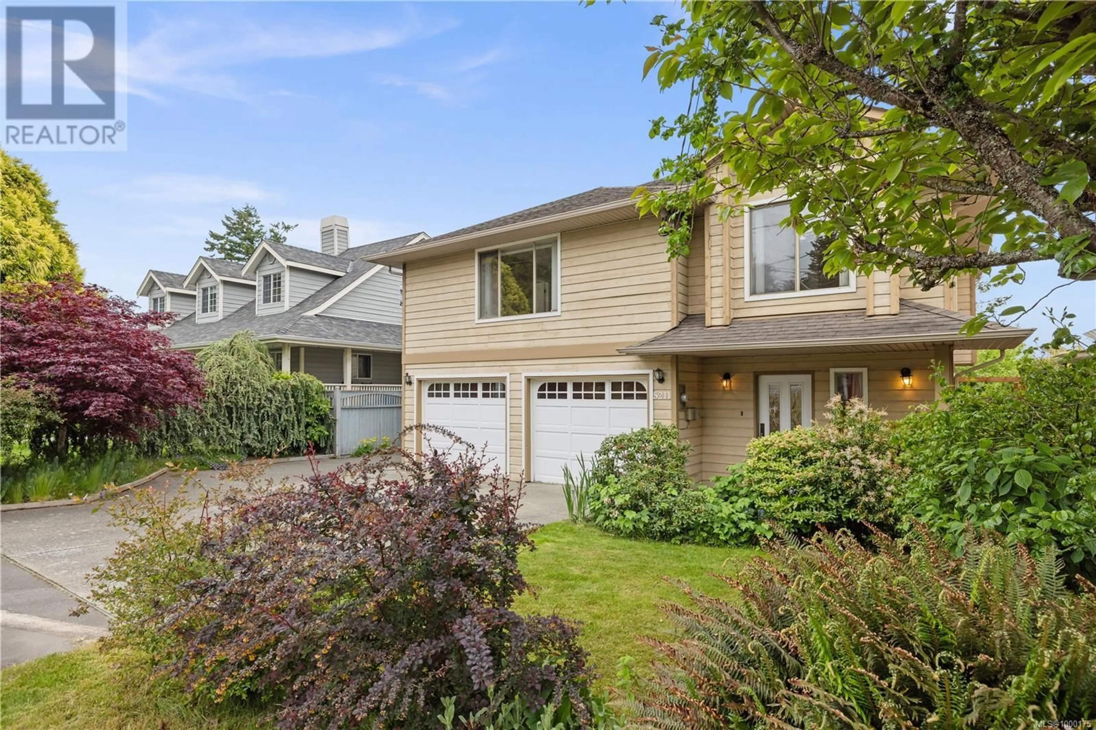 Home with vinyl exterior material, street for 5211 SARK ROAD, Saanich British Columbia V8Y2M4