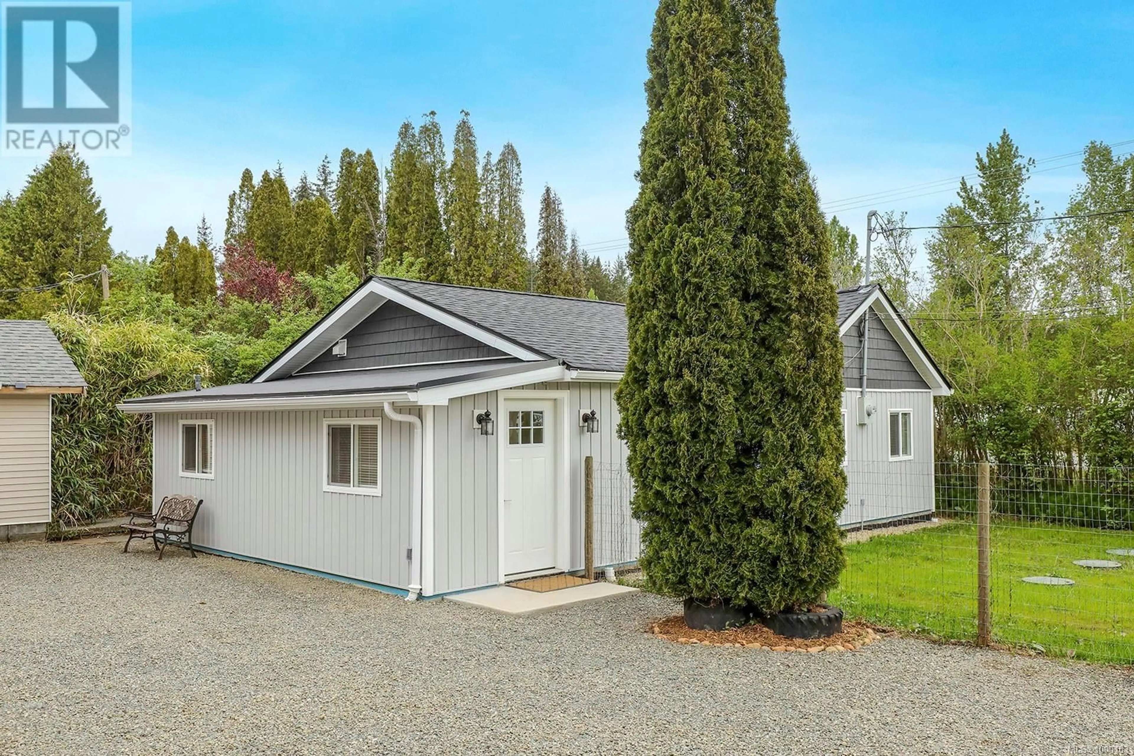 Home with vinyl exterior material, street for 6645 ISLAND HIGHWAY NORTH, Merville British Columbia V0R2M0