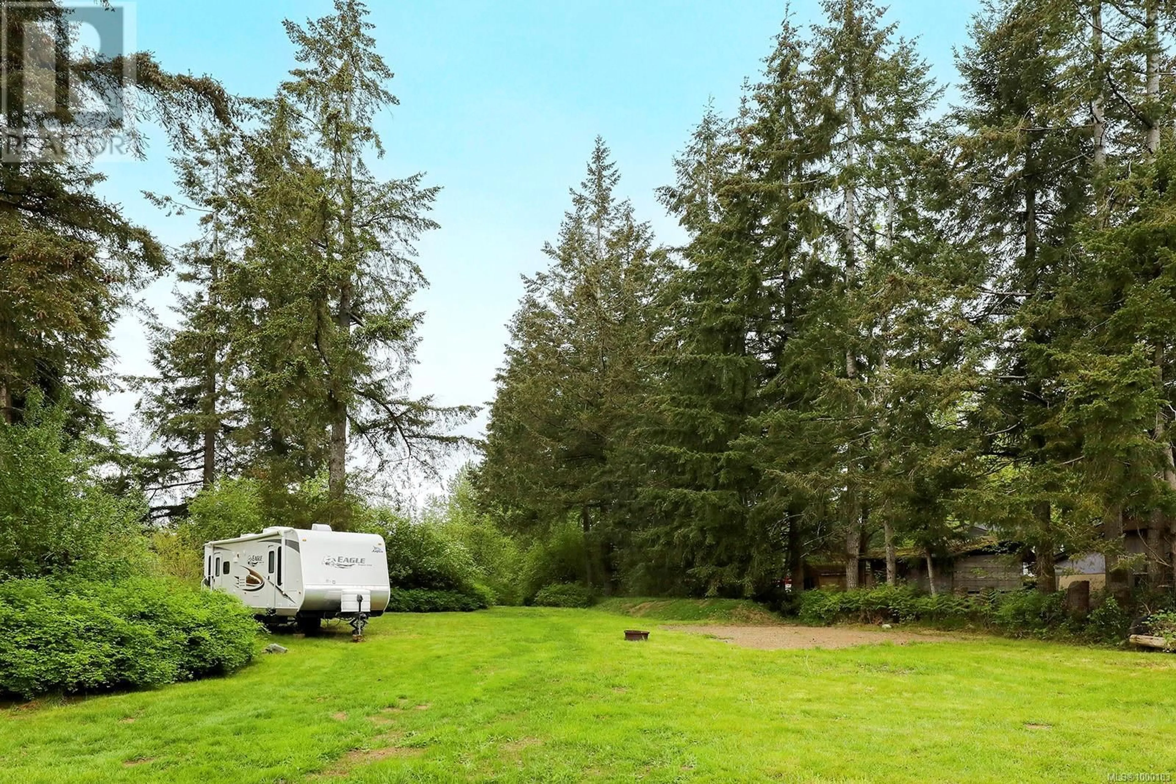 A pic from outside/outdoor area/front of a property/back of a property/a pic from drone, forest/trees view for 6645 ISLAND HIGHWAY NORTH, Merville British Columbia V0R2M0