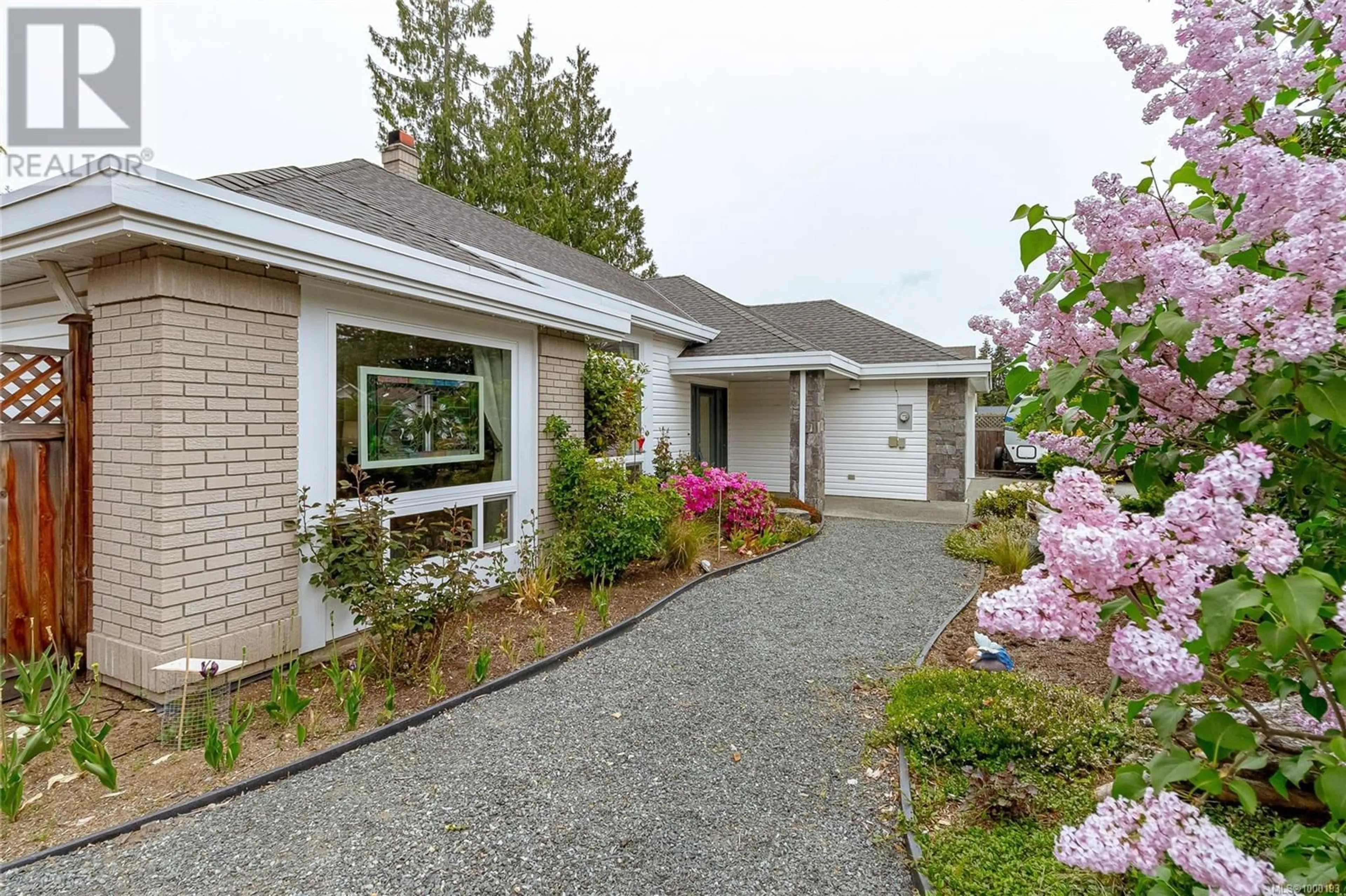 Home with brick exterior material, street for 600 NASSAU CRESCENT, Qualicum Beach British Columbia V9K1C4