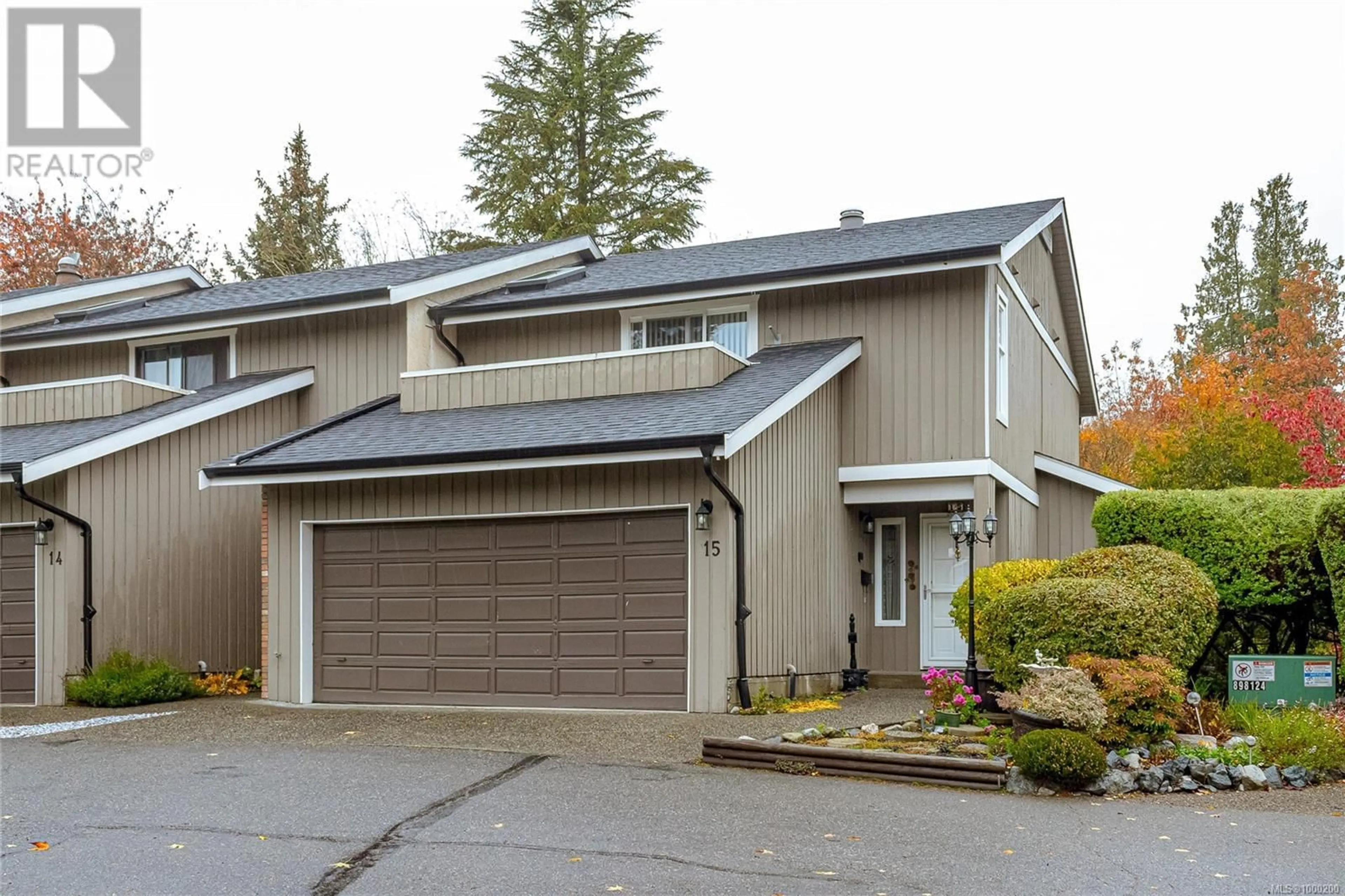 Home with vinyl exterior material, street for 15 - 1950 CULTRA AVENUE, Central Saanich British Columbia V8M1Y9