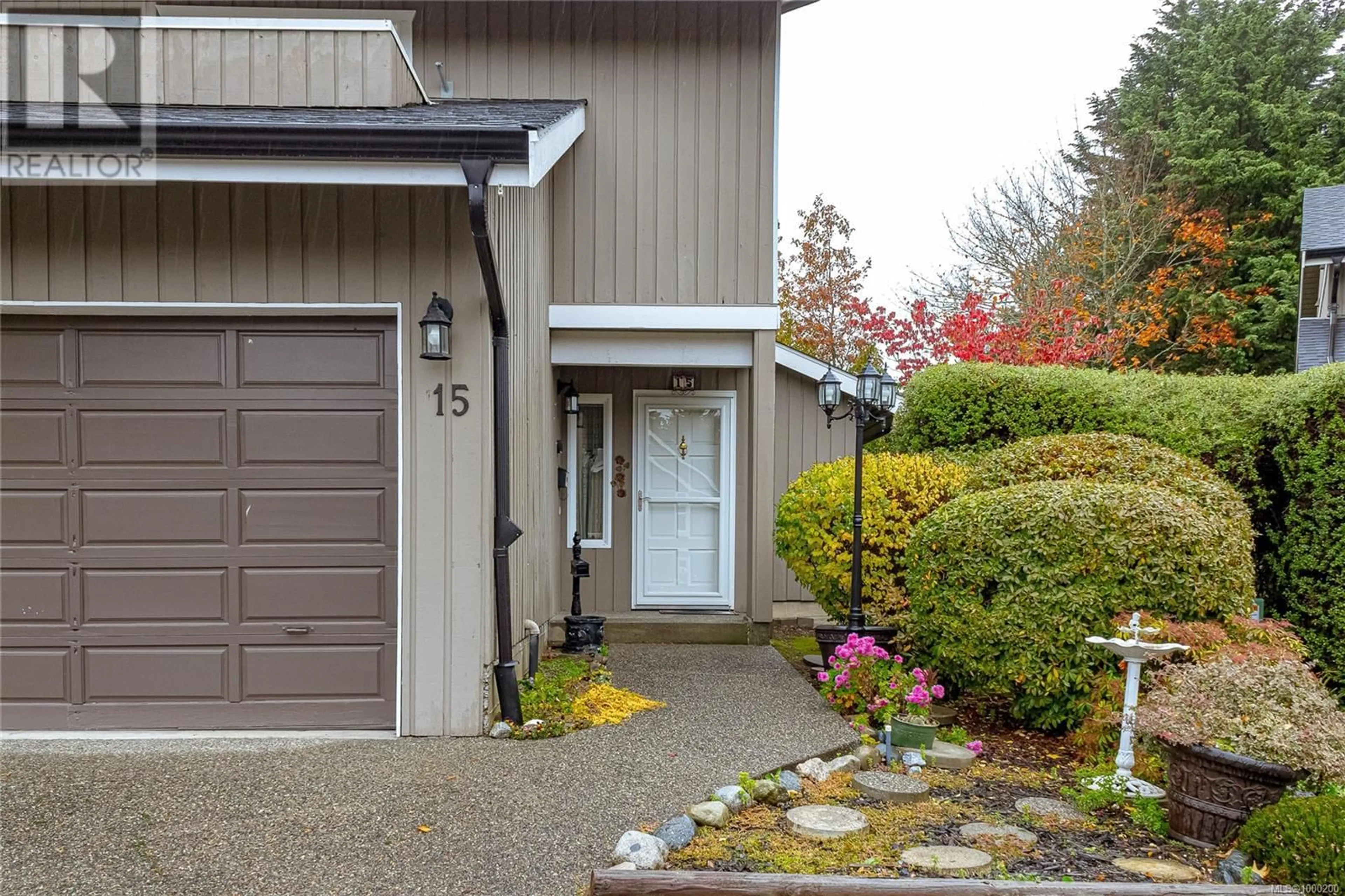 Home with vinyl exterior material, street for 15 - 1950 CULTRA AVENUE, Central Saanich British Columbia V8M1Y9