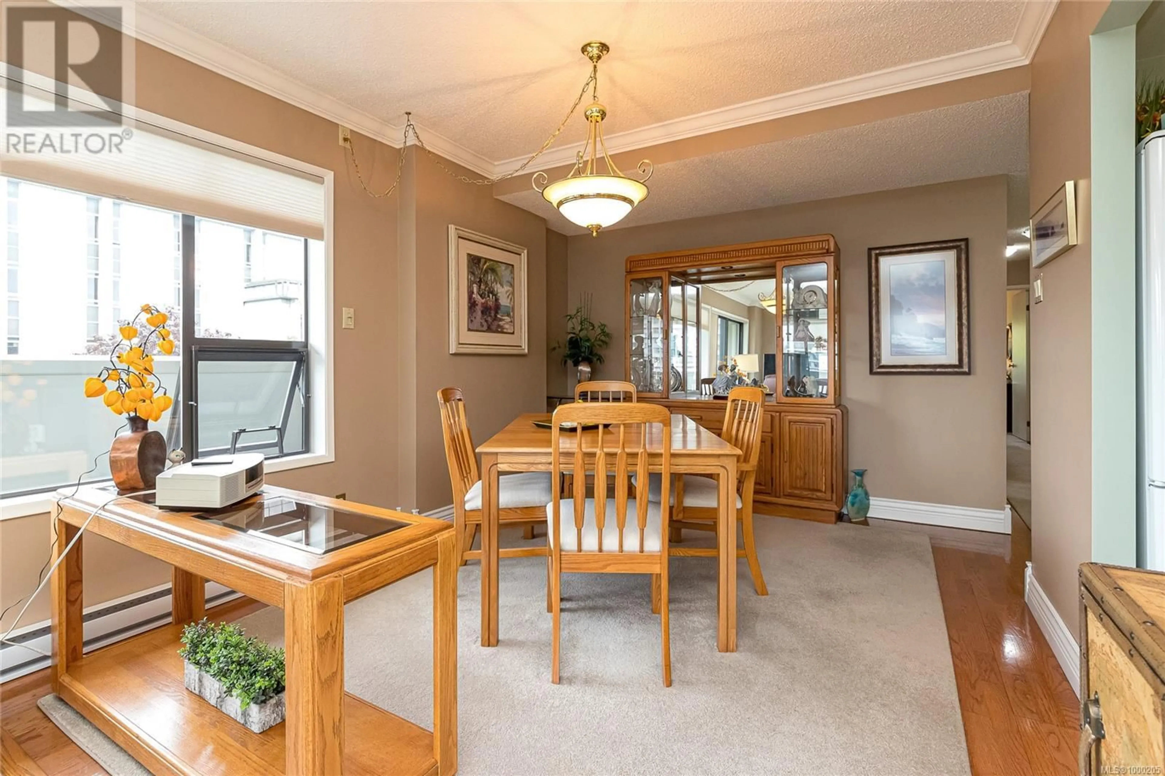 Dining room, wood/laminate floor for 603 - 819 BURDETT AVENUE, Victoria British Columbia V8W1B3
