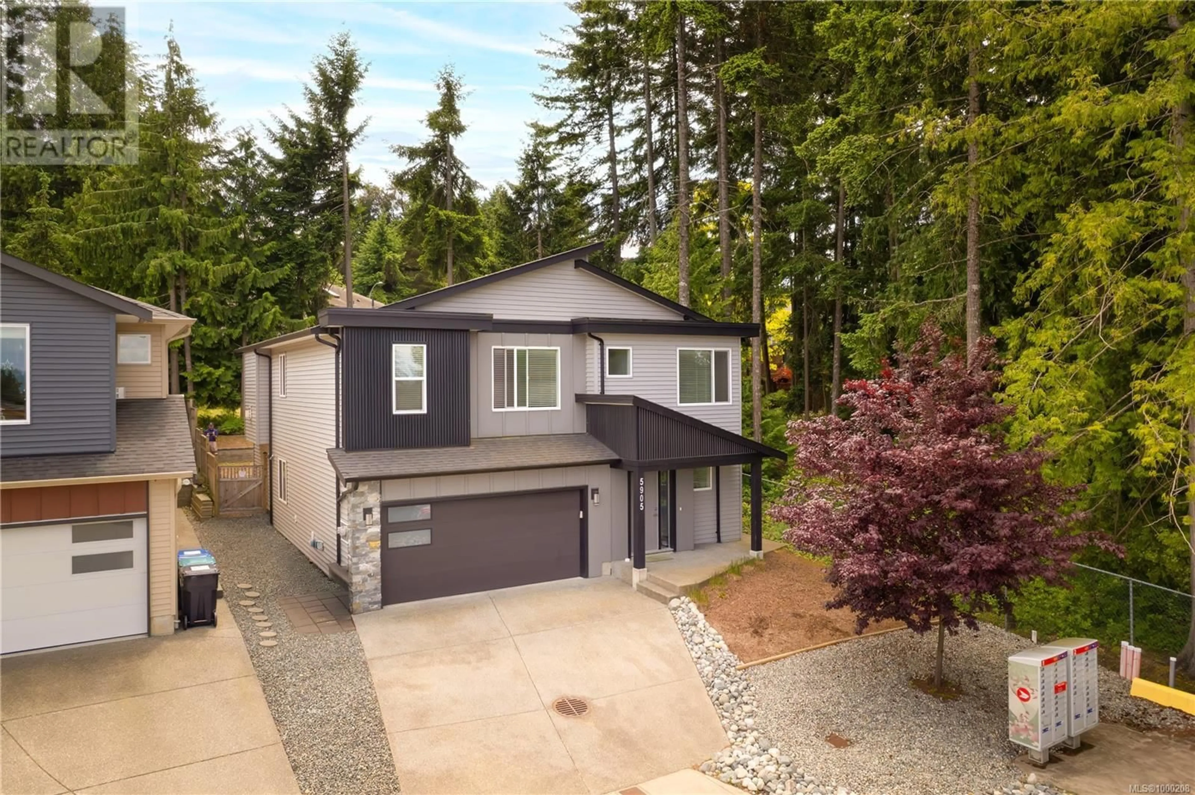 A pic from outside/outdoor area/front of a property/back of a property/a pic from drone, street for 5905 MAHOUN PLACE, Nanaimo British Columbia V9T5N3
