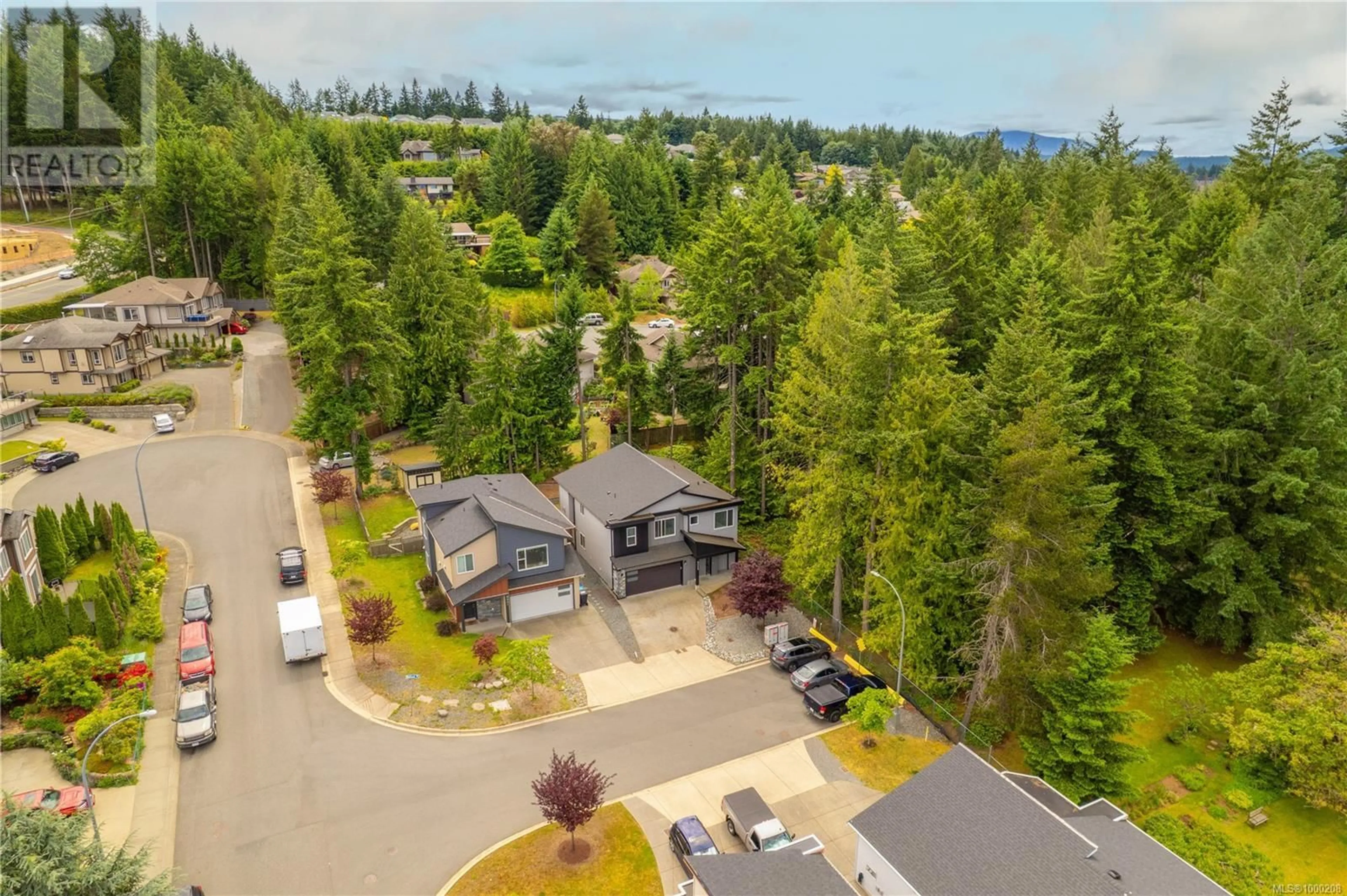 A pic from outside/outdoor area/front of a property/back of a property/a pic from drone, water/lake/river/ocean view for 5905 MAHOUN PLACE, Nanaimo British Columbia V9T5N3