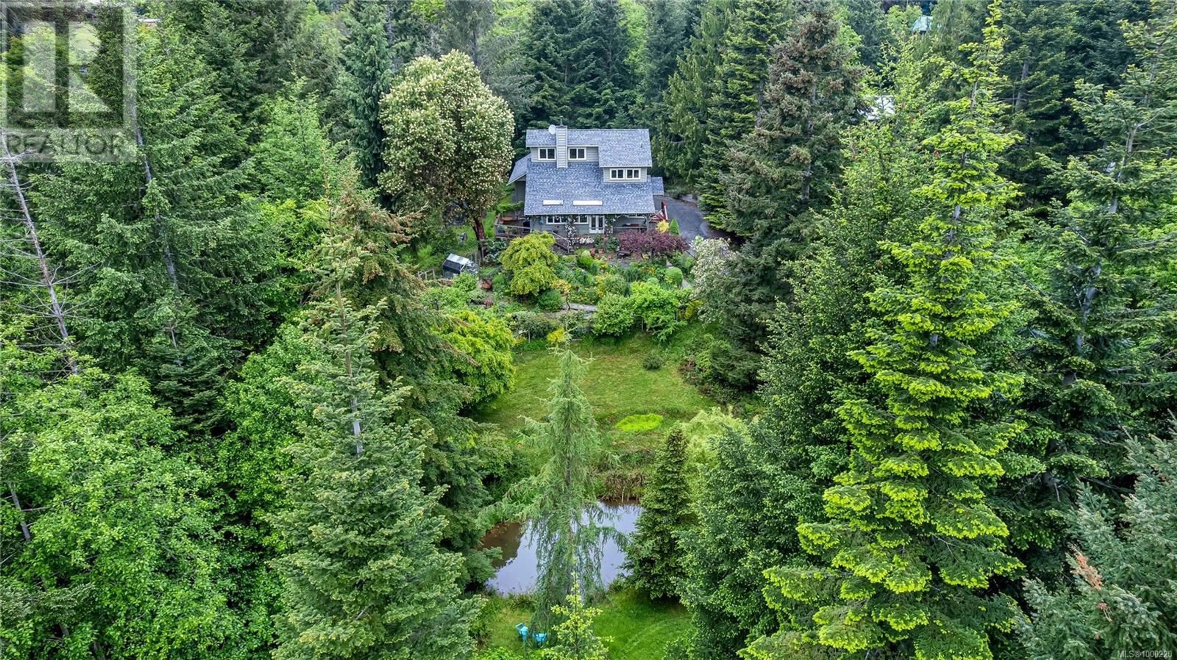A pic from outside/outdoor area/front of a property/back of a property/a pic from drone, forest/trees view for 106 FRAZIER ROAD, Salt Spring British Columbia V8K2B5