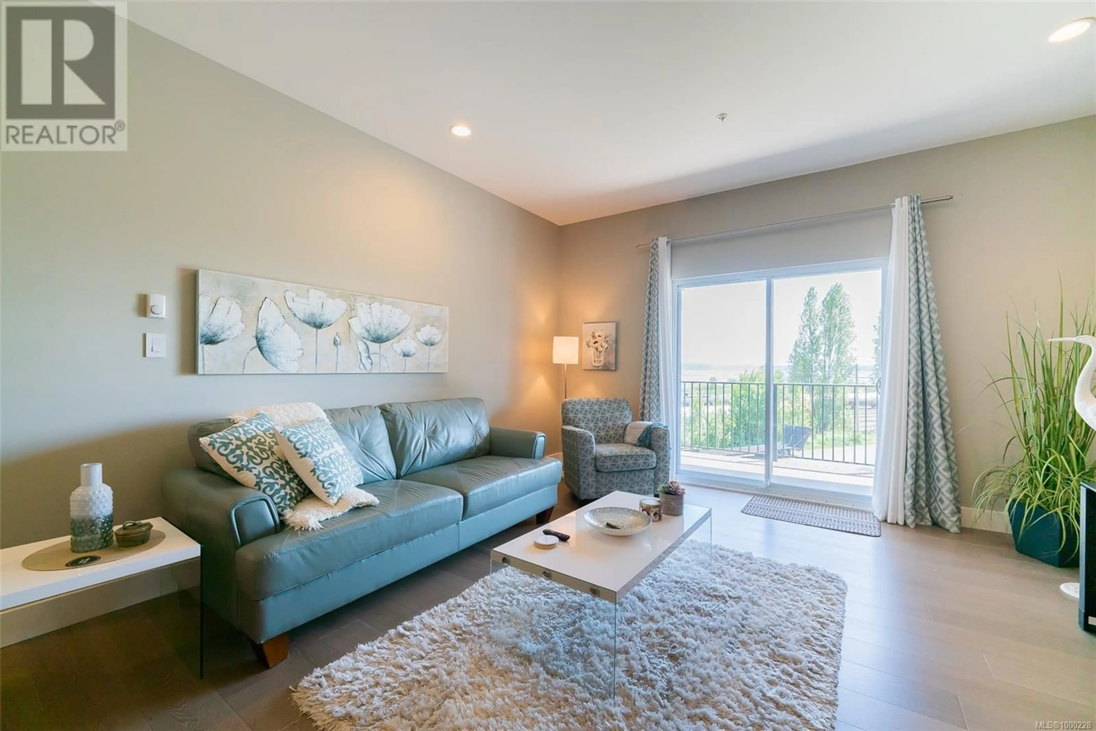 Living room with furniture, unknown for 304 - 104 ESPLANADE STREET, Nanaimo British Columbia V9R0G6