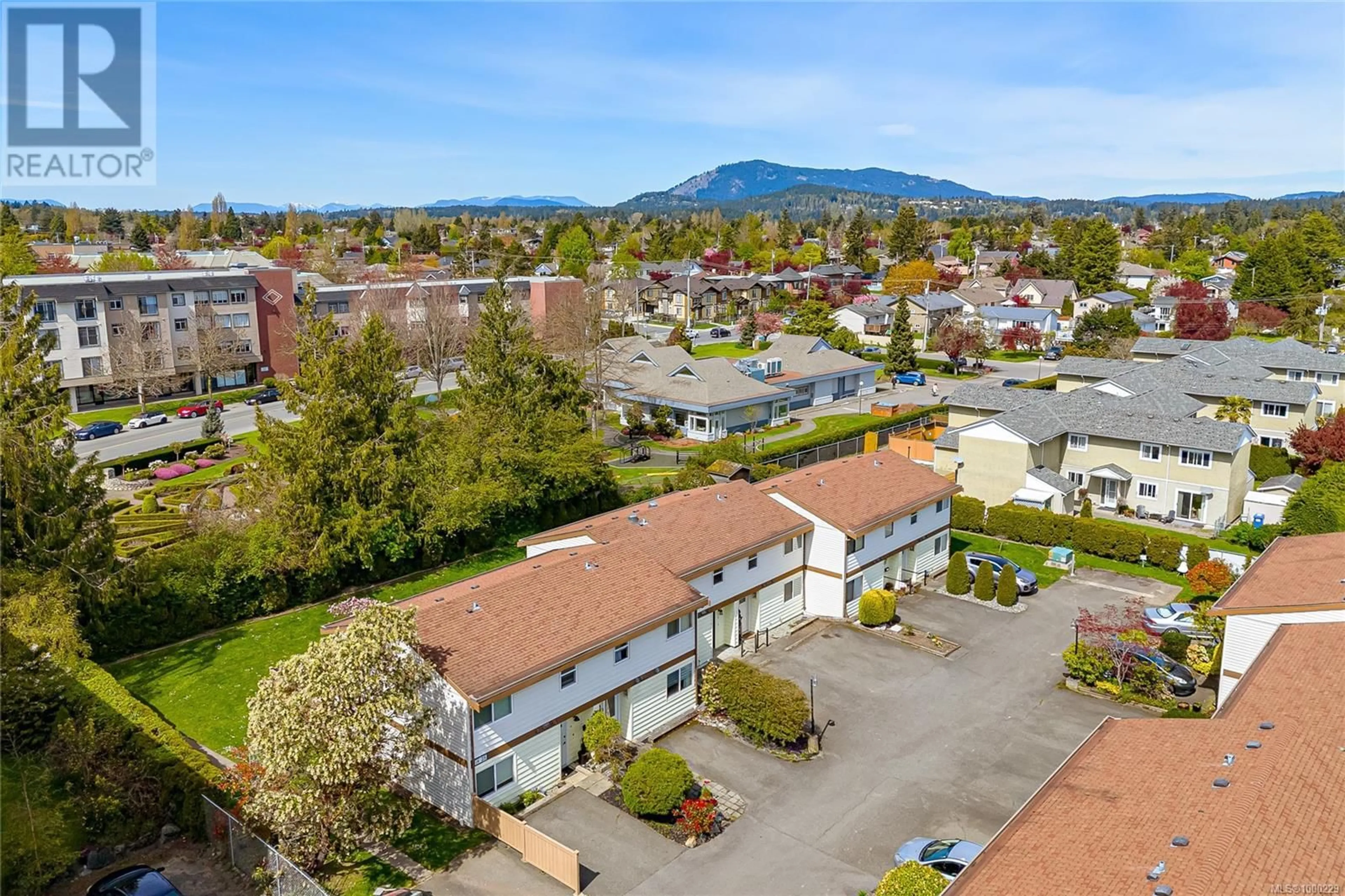 A pic from outside/outdoor area/front of a property/back of a property/a pic from drone, mountain view for 22 - 10046 FIFTH STREET, Sidney British Columbia V8L2X9