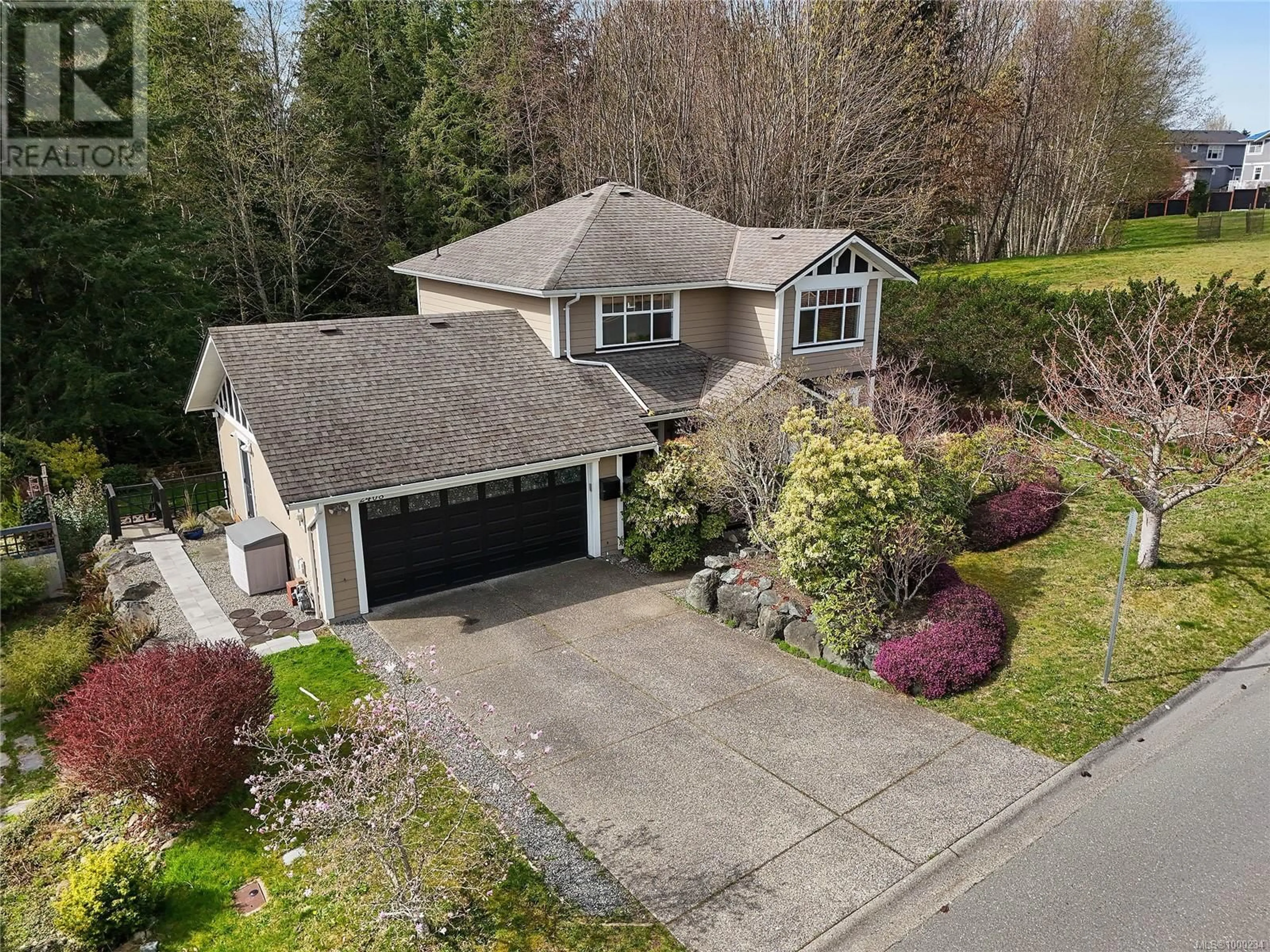 A pic from outside/outdoor area/front of a property/back of a property/a pic from drone, street for 2408 SUNRIVER WAY, Sooke British Columbia V0S1N0
