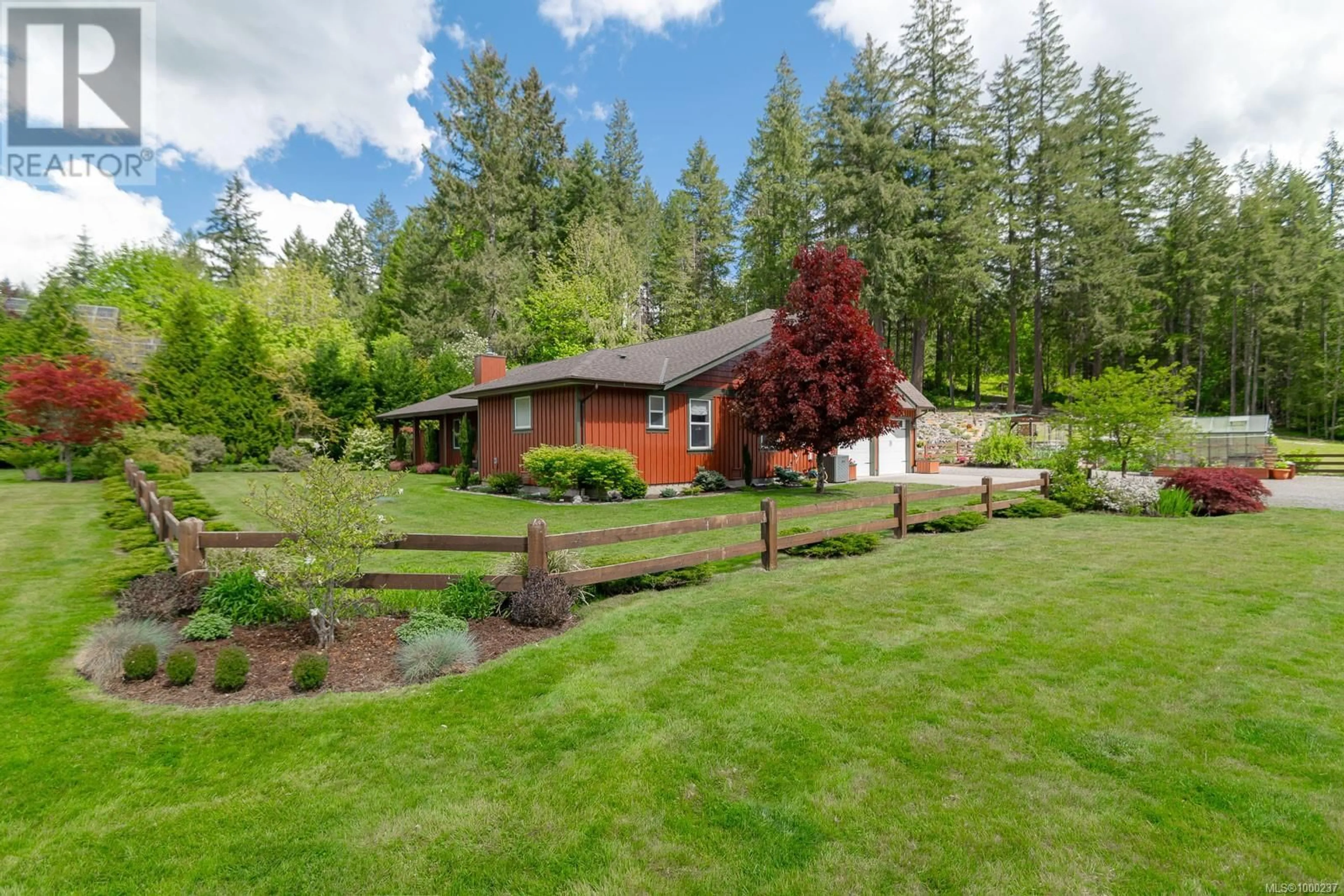 A pic from outside/outdoor area/front of a property/back of a property/a pic from drone, unknown for 4426 COWICHAN LAKE ROAD, Duncan British Columbia V9L6J7