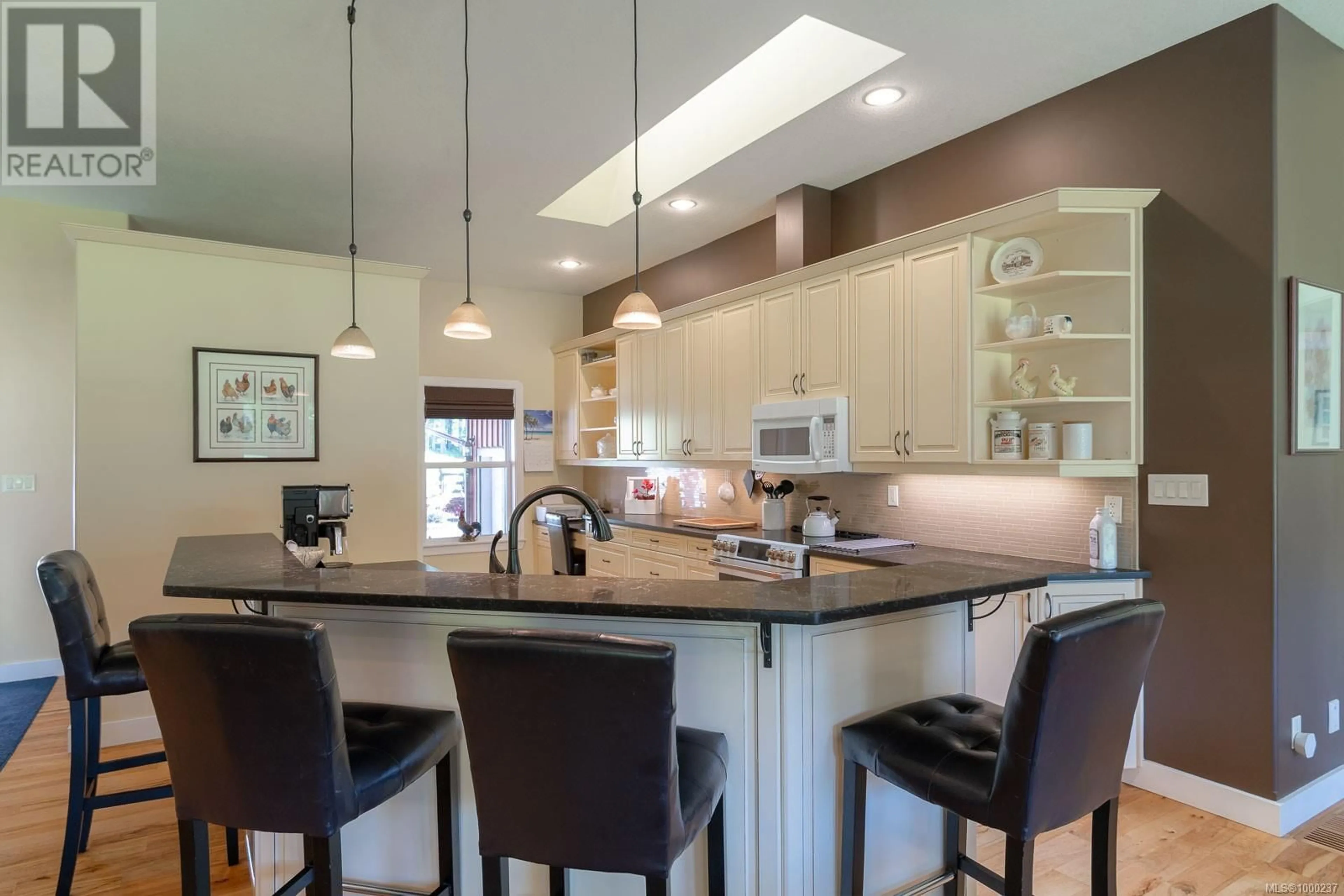 Open concept kitchen, ceramic/tile floor for 4426 COWICHAN LAKE ROAD, Duncan British Columbia V9L6J7