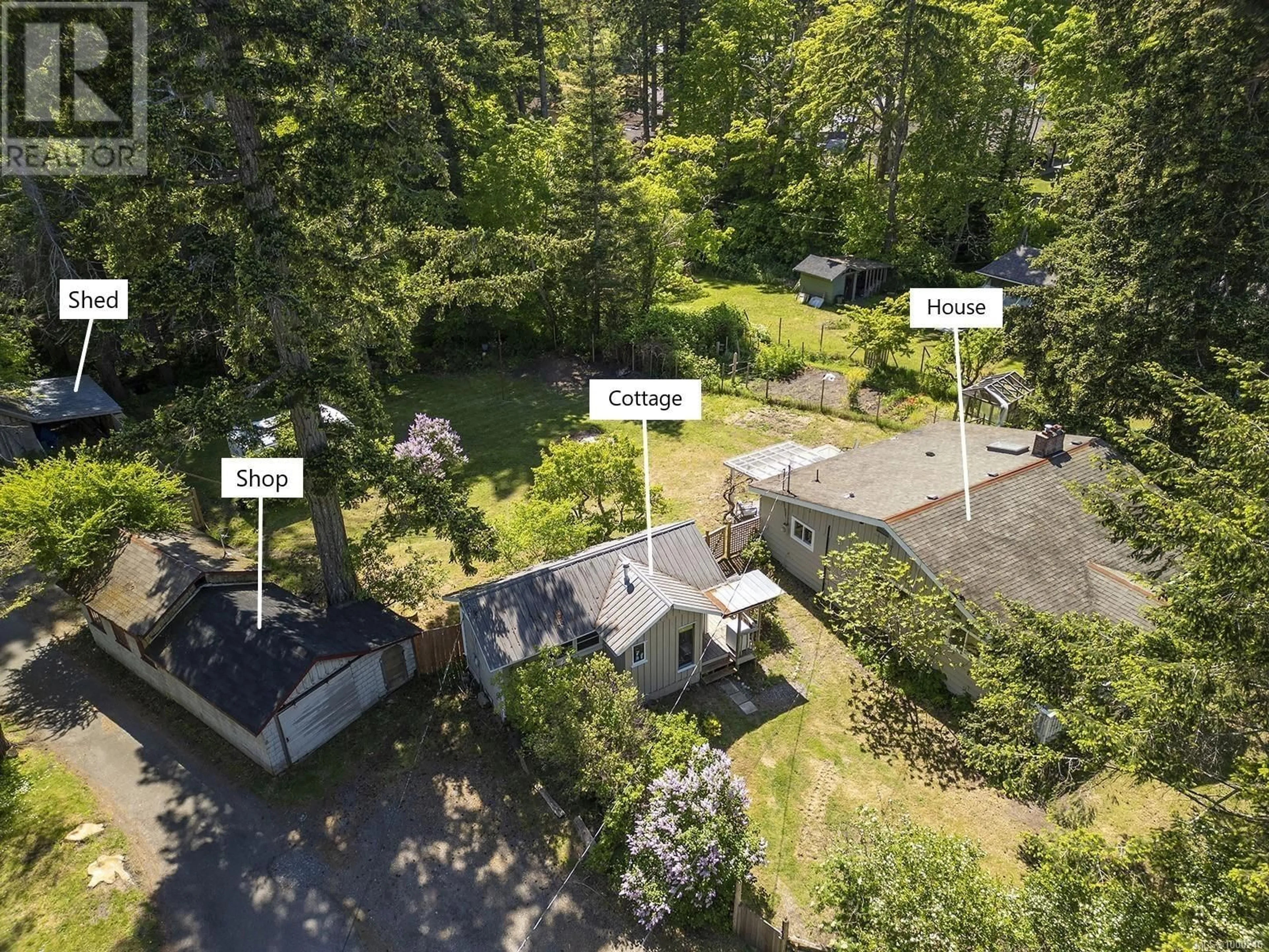 A pic from outside/outdoor area/front of a property/back of a property/a pic from drone, forest/trees view for 1143 DENNY ROAD, Comox British Columbia V9M4B5
