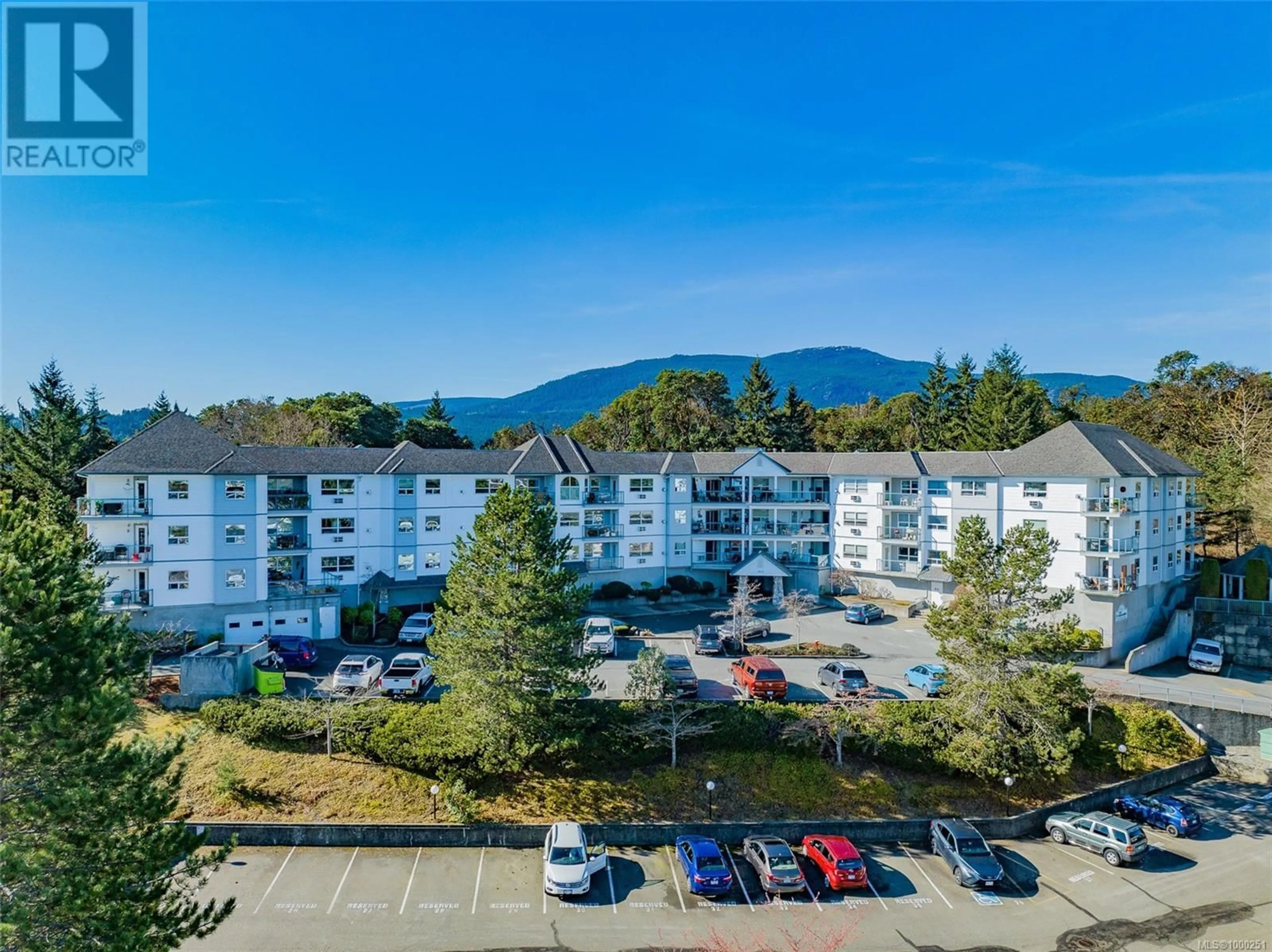 A pic from outside/outdoor area/front of a property/back of a property/a pic from drone, mountain view for 211 - 1633 DUFFERIN CRESCENT, Nanaimo British Columbia V9S5T4
