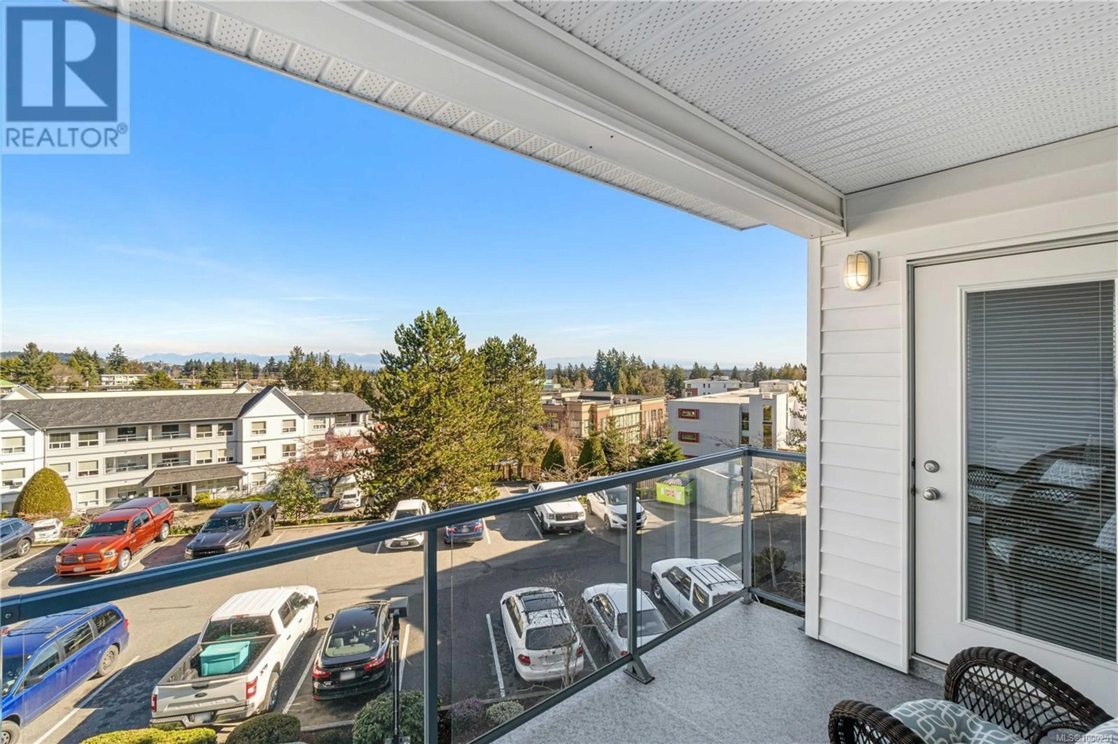 Balcony in the apartment, city buildings view from balcony for 211 - 1633 DUFFERIN CRESCENT, Nanaimo British Columbia V9S5T4
