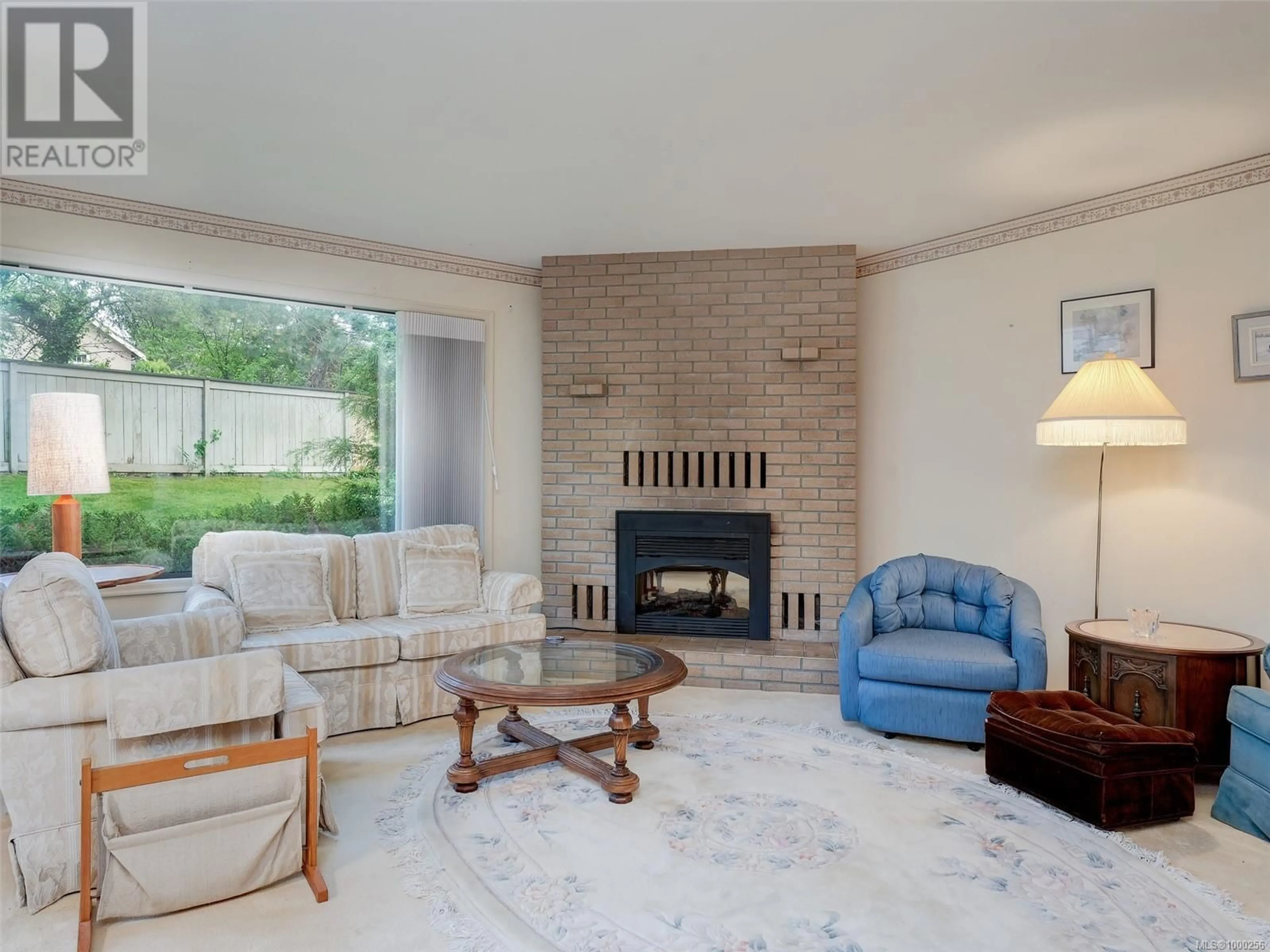 Living room with furniture, ceramic/tile floor for 7 - 1309 MCKENZIE AVENUE, Saanich British Columbia V8P2M1