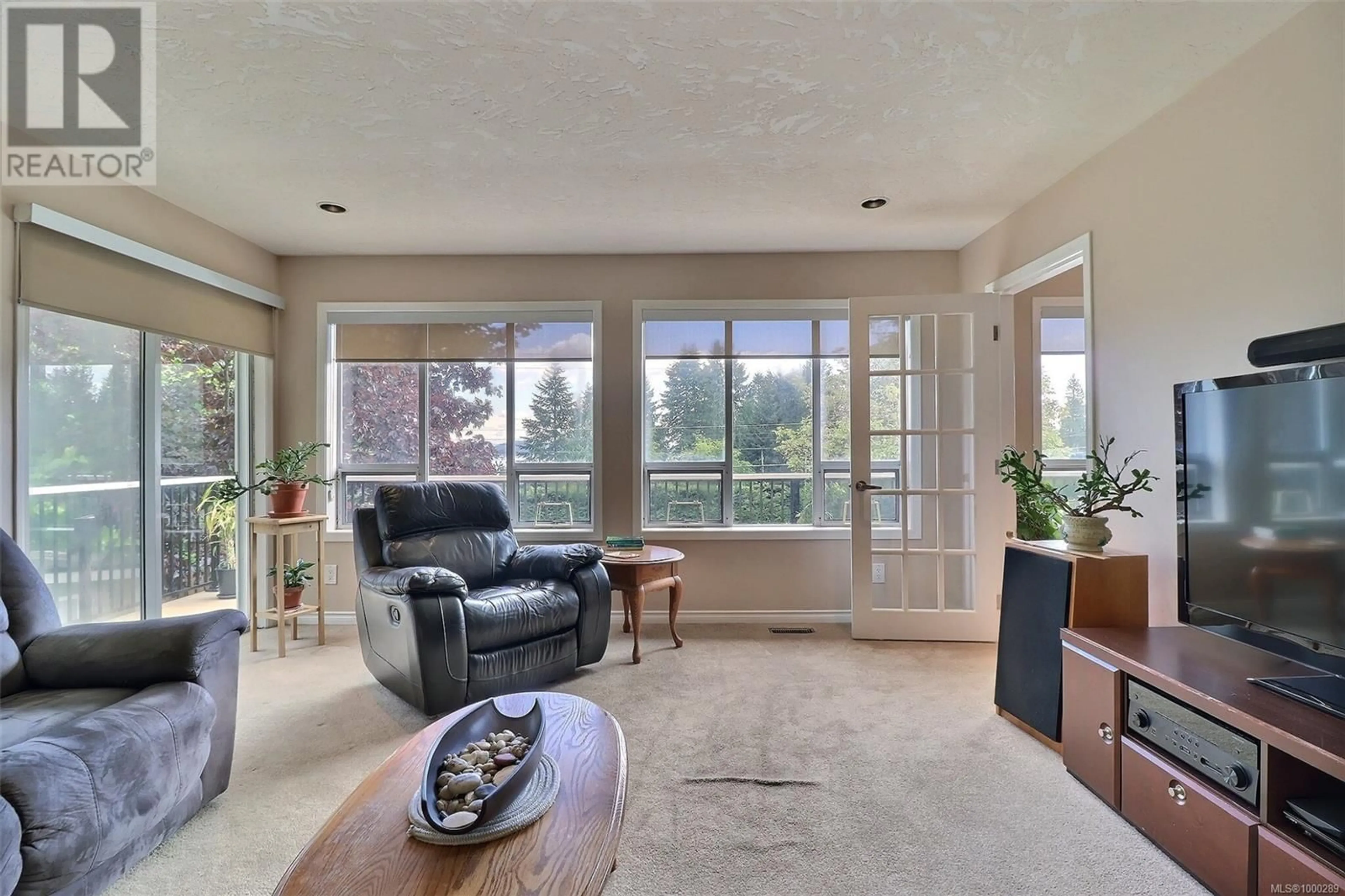 Living room with furniture, ceramic/tile floor for 2540 LODGEPOLE ROAD, Mill Bay British Columbia V0R2P0