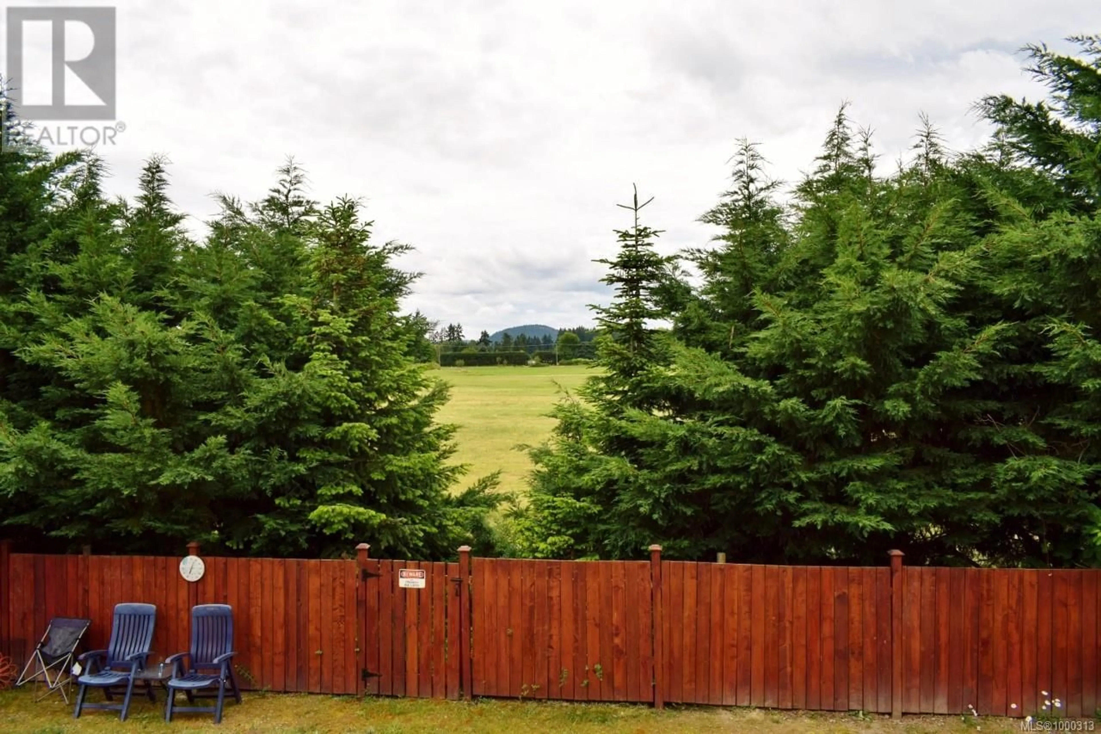 A pic from outside/outdoor area/front of a property/back of a property/a pic from drone, forest/trees view for 1976 FALCON CRESCENT, Cowichan Bay British Columbia V0R1N1