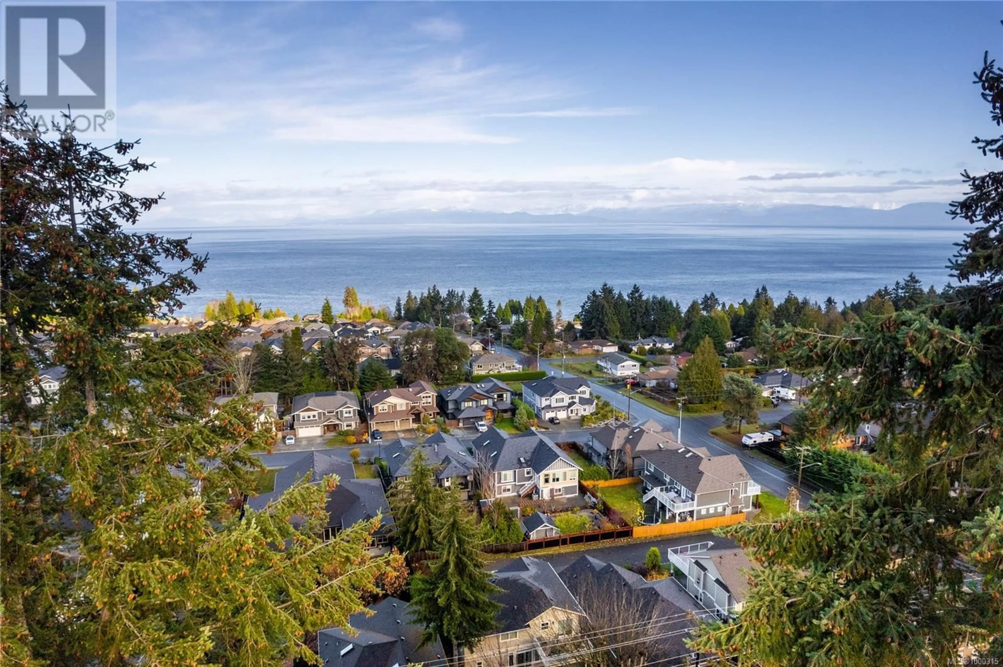A pic from outside/outdoor area/front of a property/back of a property/a pic from drone, water/lake/river/ocean view for 5611/5621 HAMMOND BAY ROAD, Nanaimo British Columbia V9T5N2