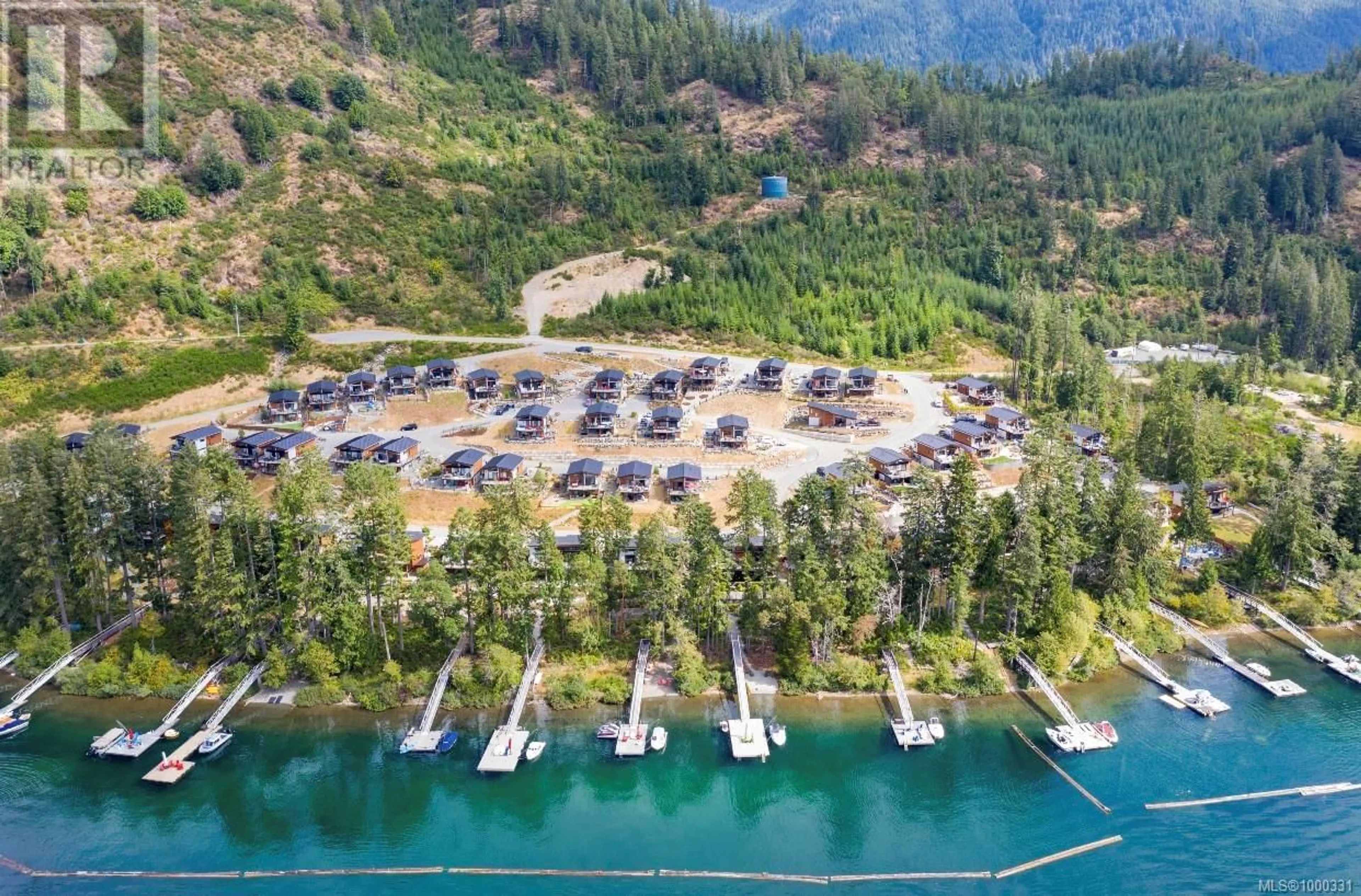 A pic from outside/outdoor area/front of a property/back of a property/a pic from drone, water/lake/river/ocean view for 7404 COTTAGE WAY, Lake Cowichan British Columbia V0R2G1