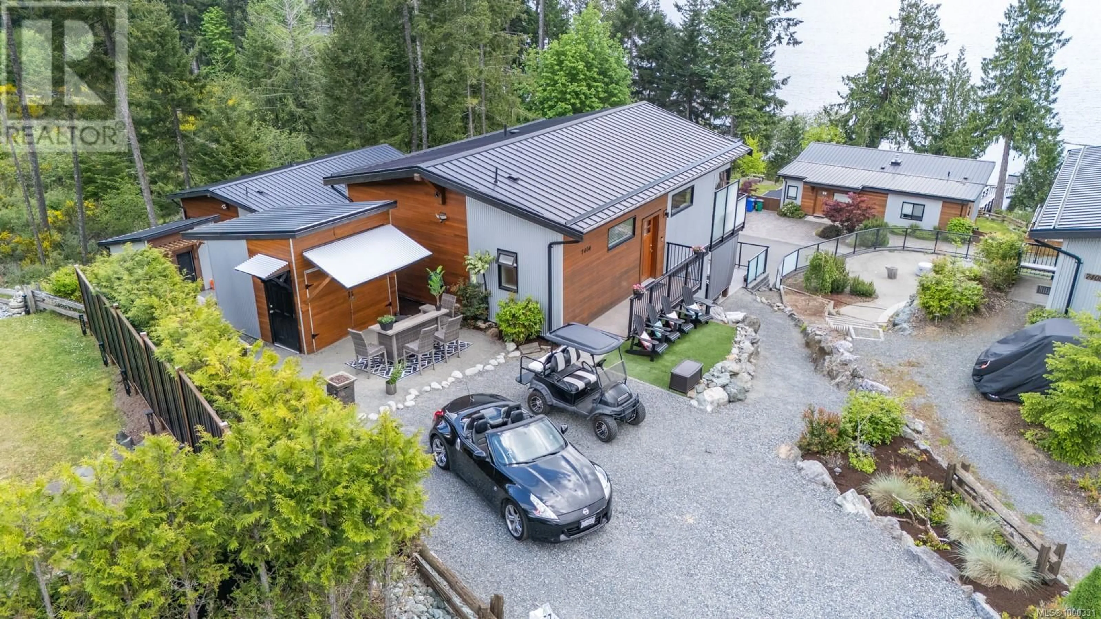A pic from outside/outdoor area/front of a property/back of a property/a pic from drone, street for 7404 COTTAGE WAY, Lake Cowichan British Columbia V0R2G1