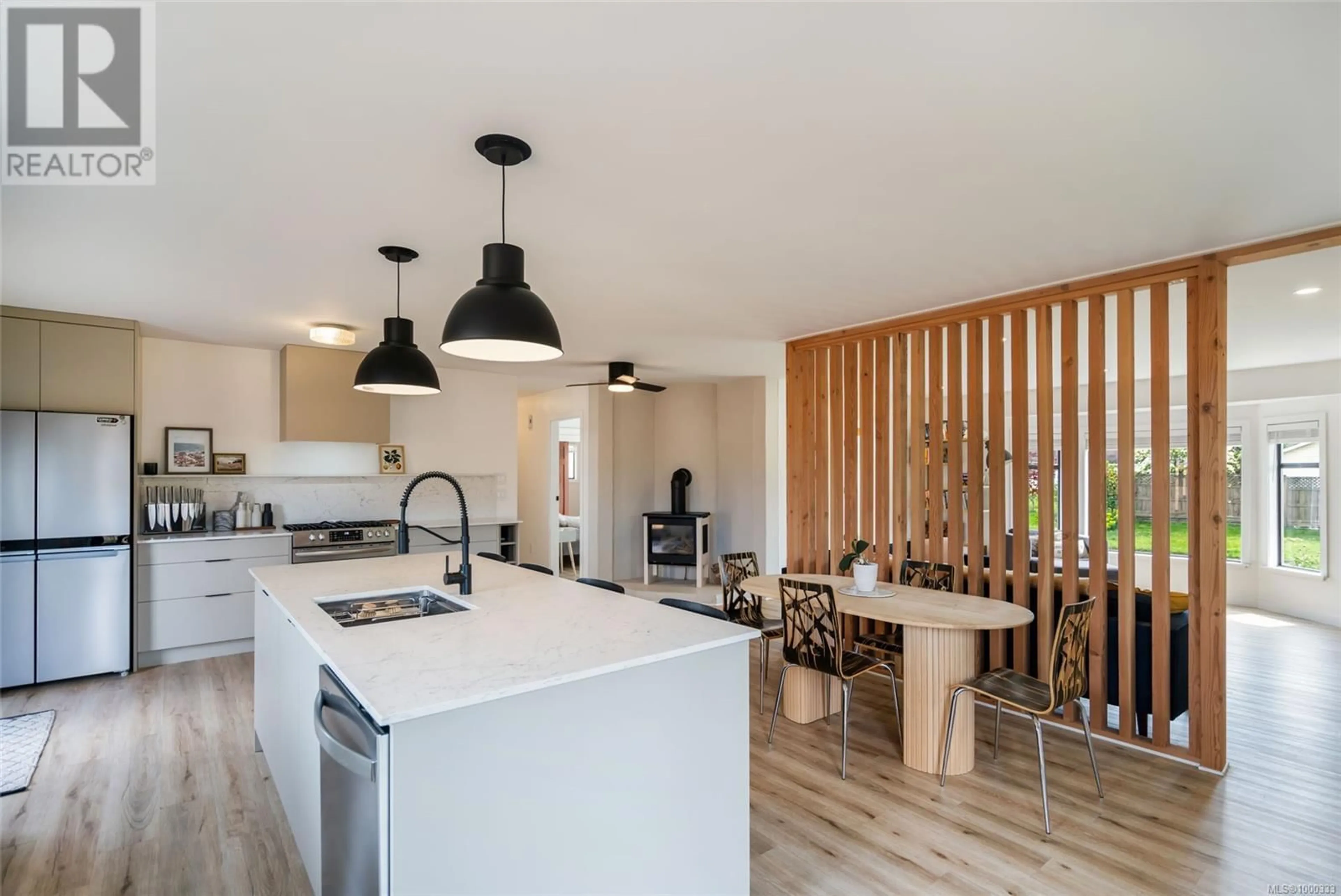 Open concept kitchen, wood/laminate floor for 747 CAMAS WAY, Parksville British Columbia V9P1E3